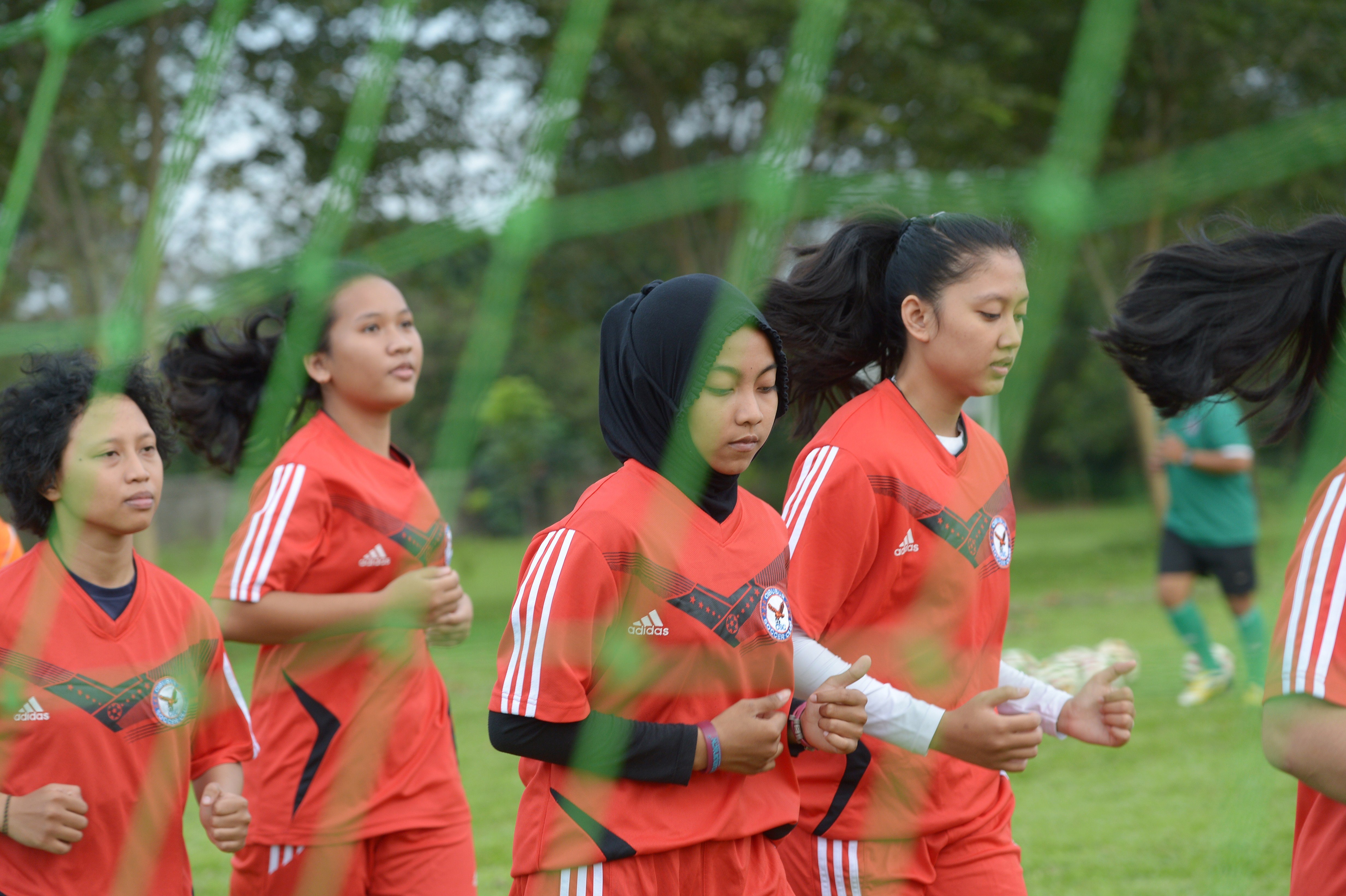 Members of CSC Women Soccer Indonesia take part in training. Photo: AFP via Getty Images