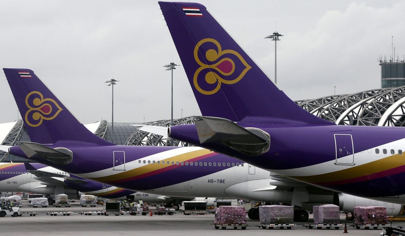 The Thai Airways flight was on the ground at Shanghai for seven hours pending medical checks on passengers and crew. Photo: EPA