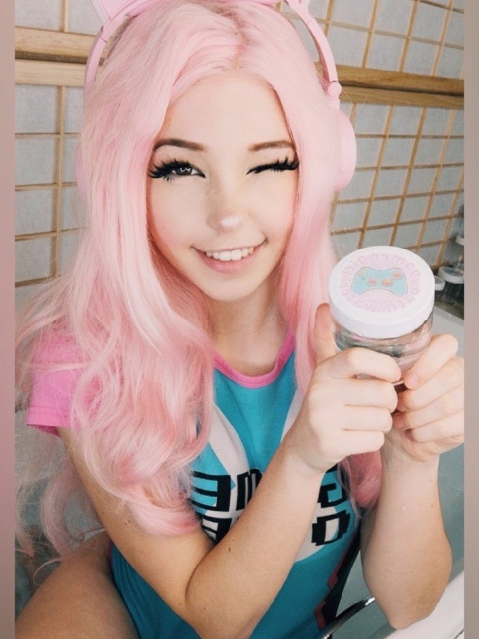Belle Delphine with a US$30 jar of her bath water for sale.