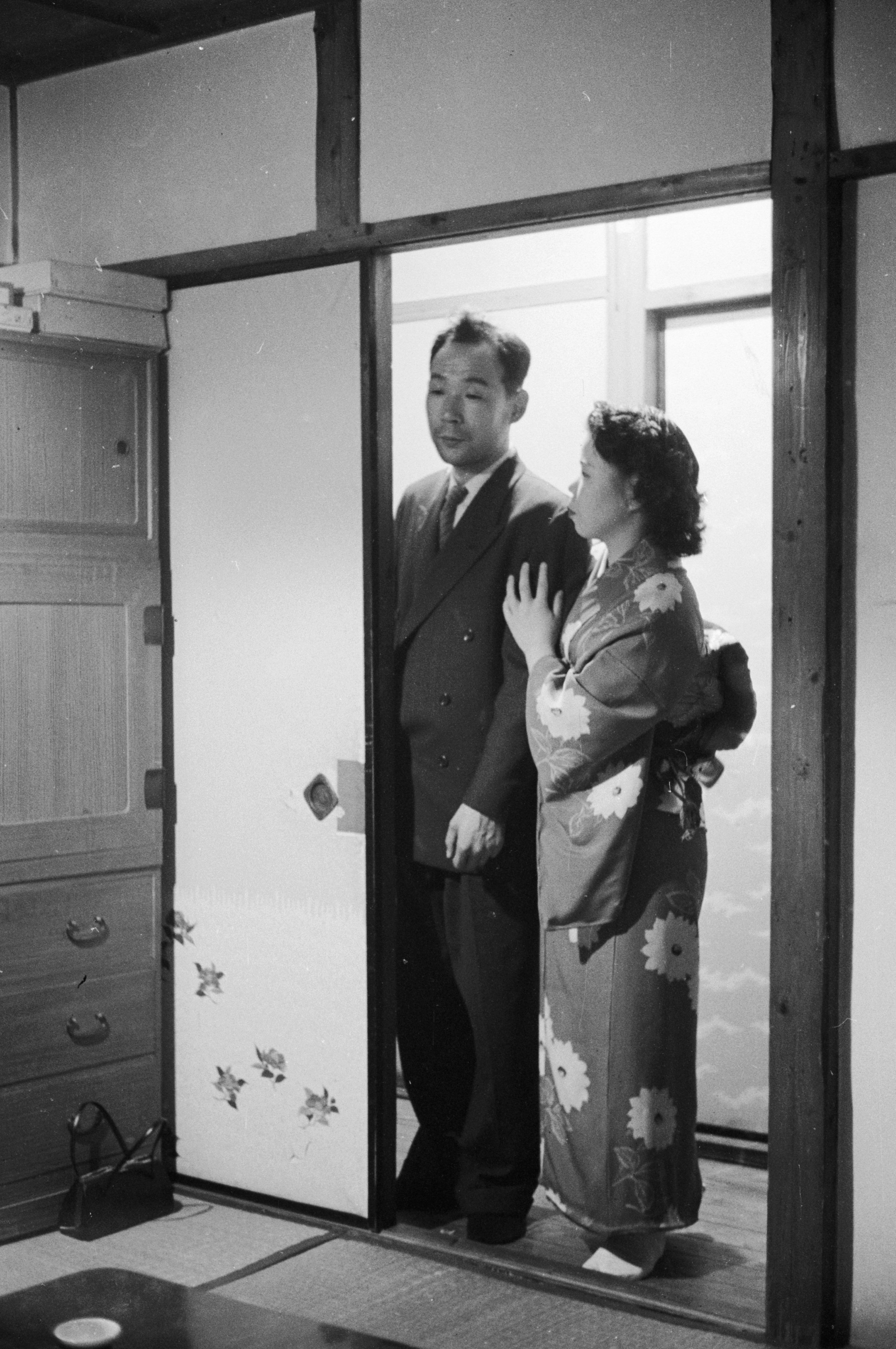 A prostitute from Yoshiwara shows her client into a bedroom. Photo: Orlando/Three Lions/Getty Images