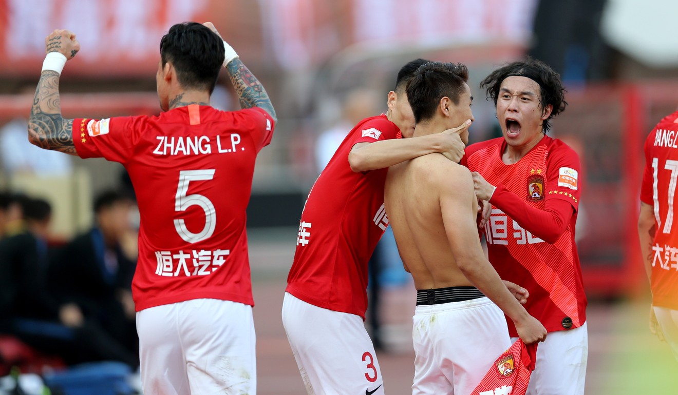 Wei Shihao (without jersey) celebrates when Guangzhou Evergrande clinch the 2019 Chinese Super League title. Wei was fined RMB300,000 by the club for misbehaviour during a China national team training camp last year. Photo: Xinhua
