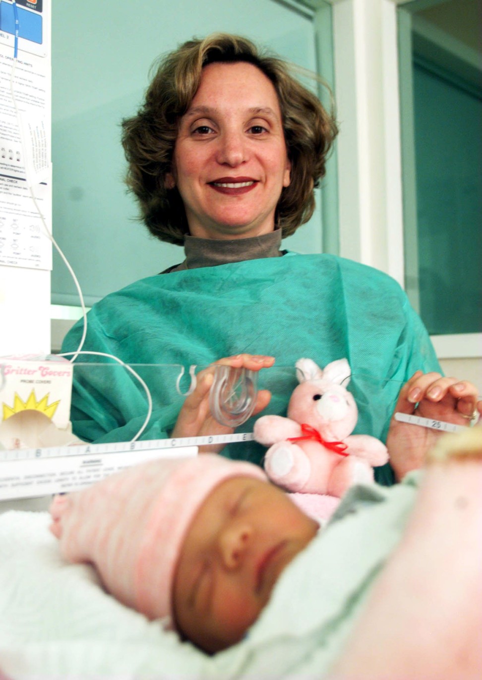 Roberta Lipson, co-founder and chief executive officer of the Beijing United Family’s Hospital, with a newborn baby at what was then called Chindex International on 14 April 1999. Photo: SCMP
