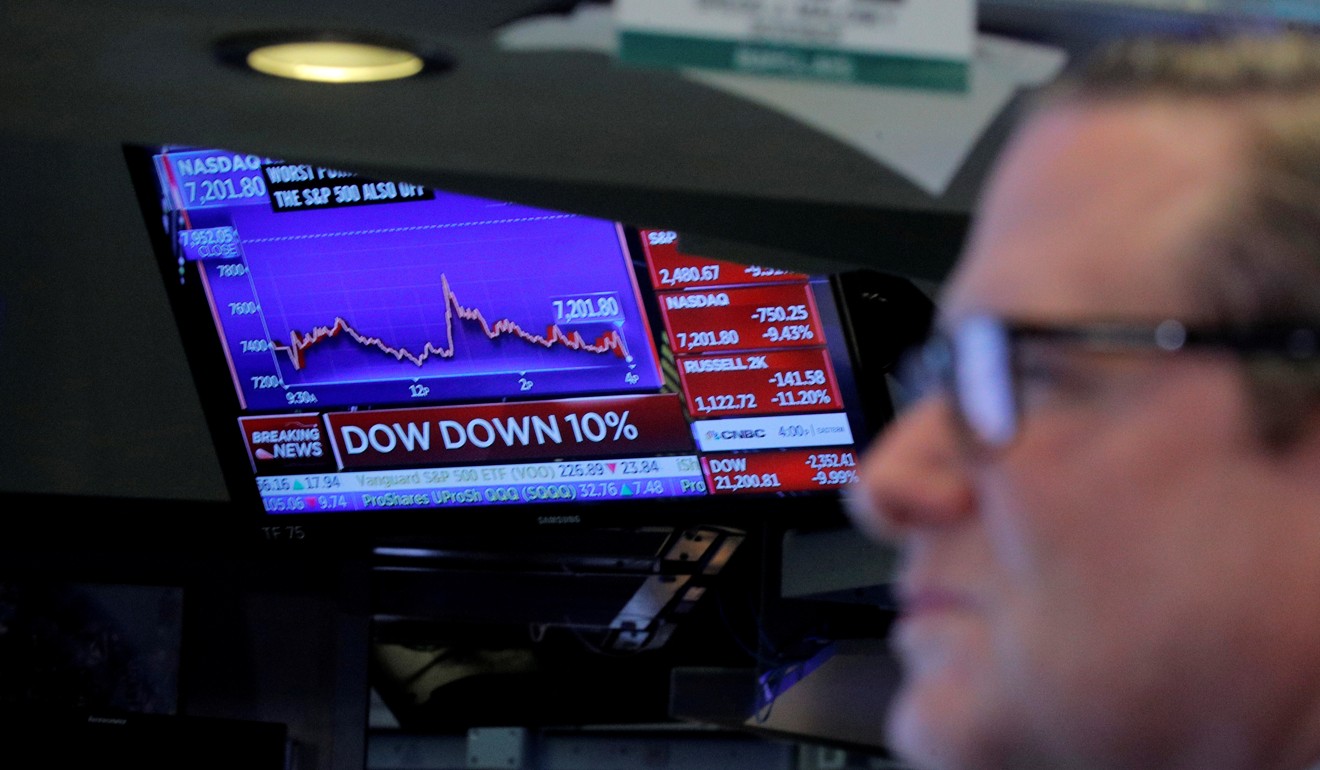 Traders on the floor of the New York Stock Exchange after the close of trading on Thursday. Photo: Reuters