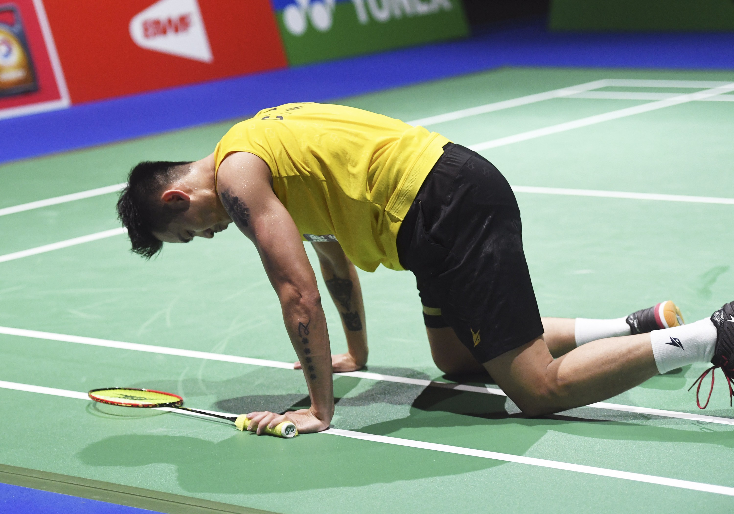 China's Lin Dan falls down during his second round match at 2019 BWF World Championships in Basel. Can he still qualify for his fifth Olympic Games in Tokyo? Photo: Xinhua