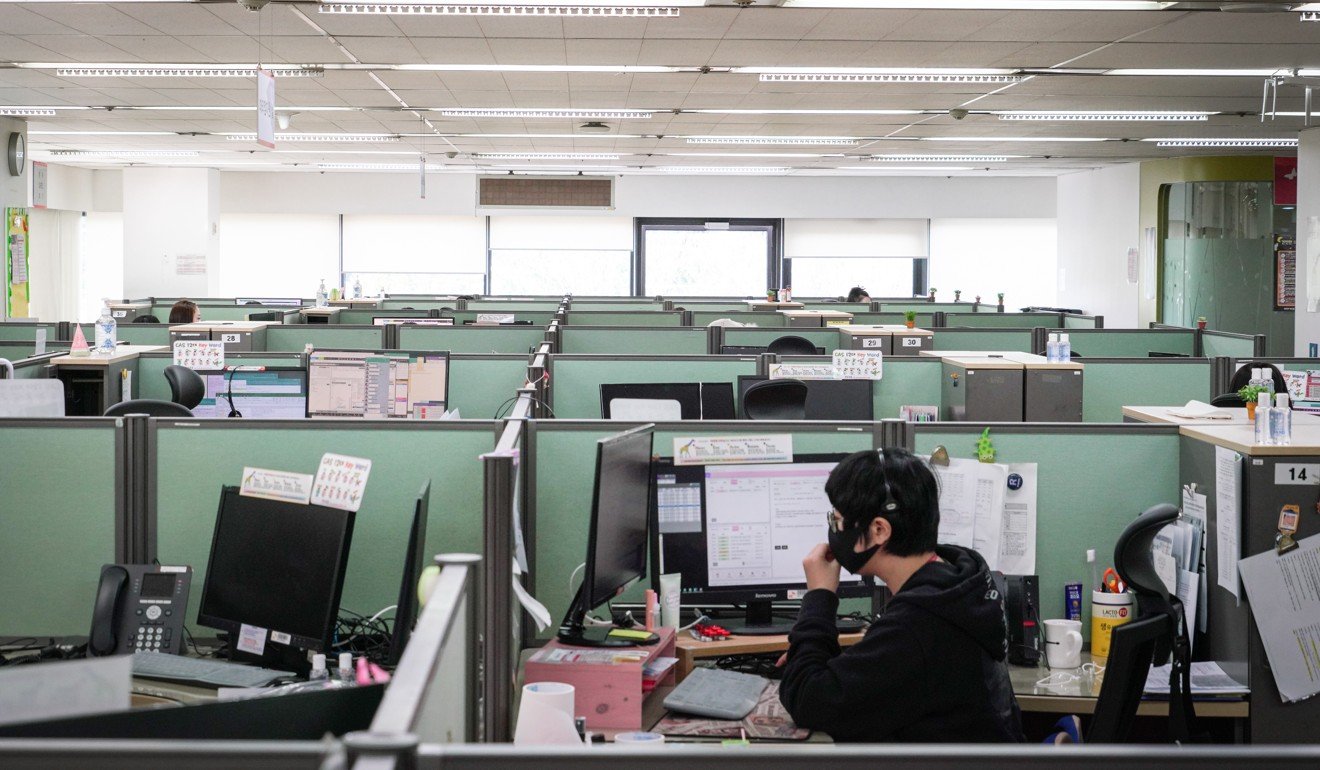 A nearly empty customer call centre in the Gocheok-dong neighbourhood of Seoul as workers isolate or work from home. Photo: EPA