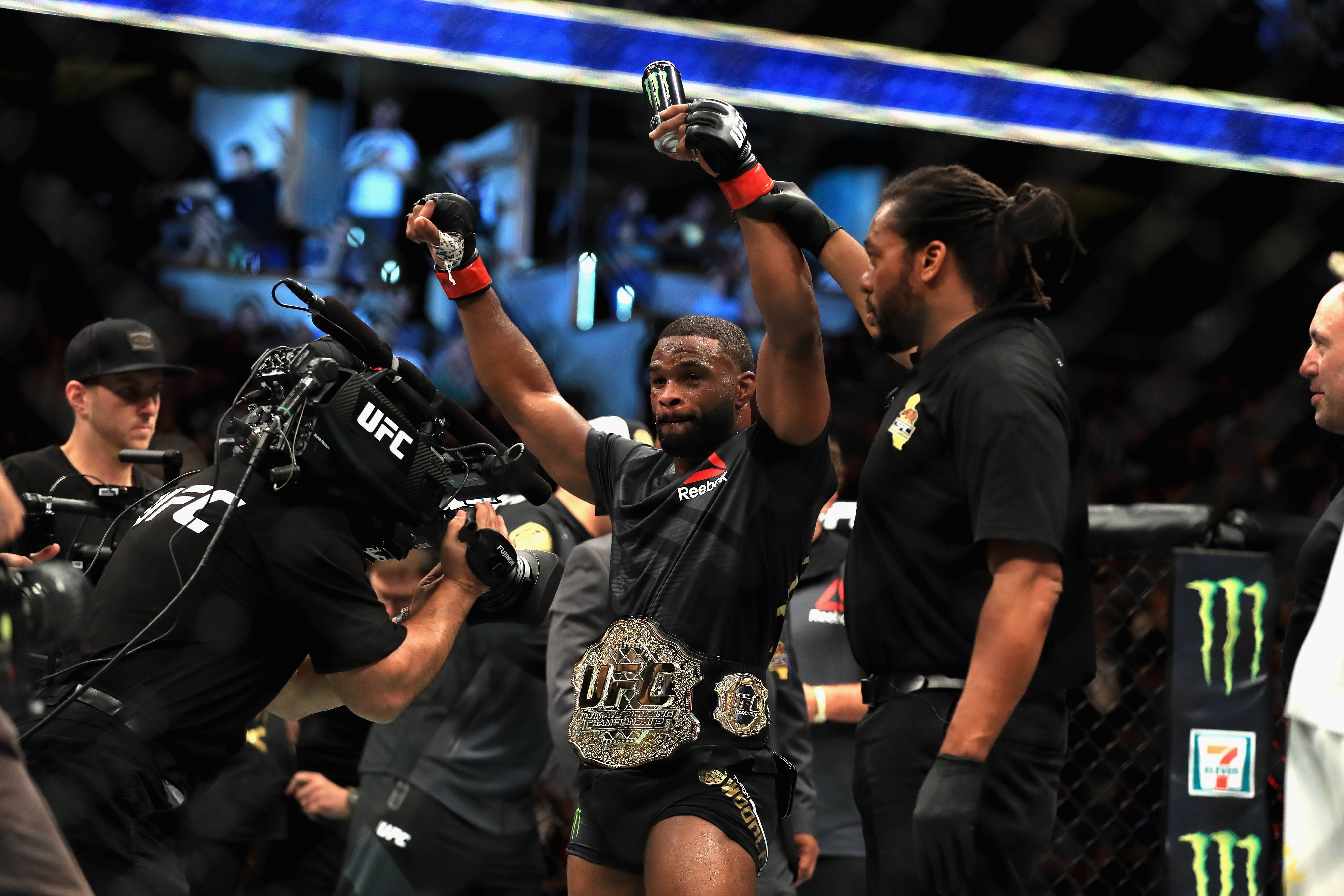 Tyron Woodley celebrates after defeating Demian Maia in a welterweight title defence at UFC 214 in 2017. Photo: AFP
