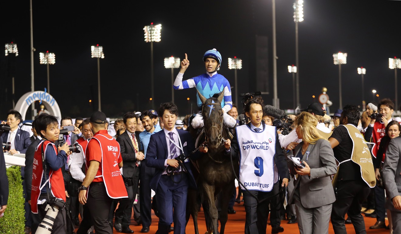 Joao Moreira wins the Dubai Turf on Vivlos in 2017.