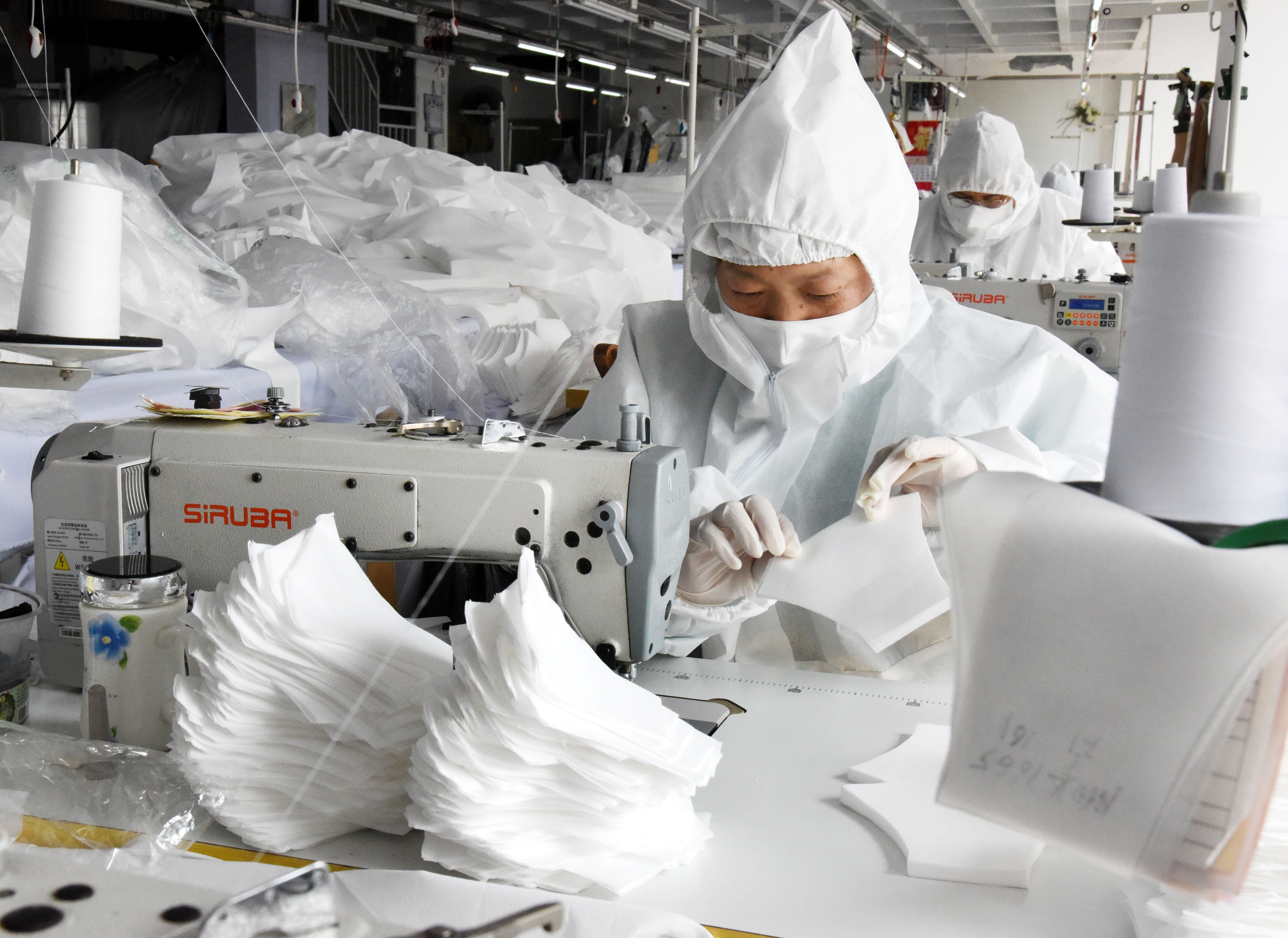 fad praktiserende læge Jeg har en engelskundervisning China boosts face mask production capacity by 450 per cent in a month,  threatening a glut scenario | South China Morning Post