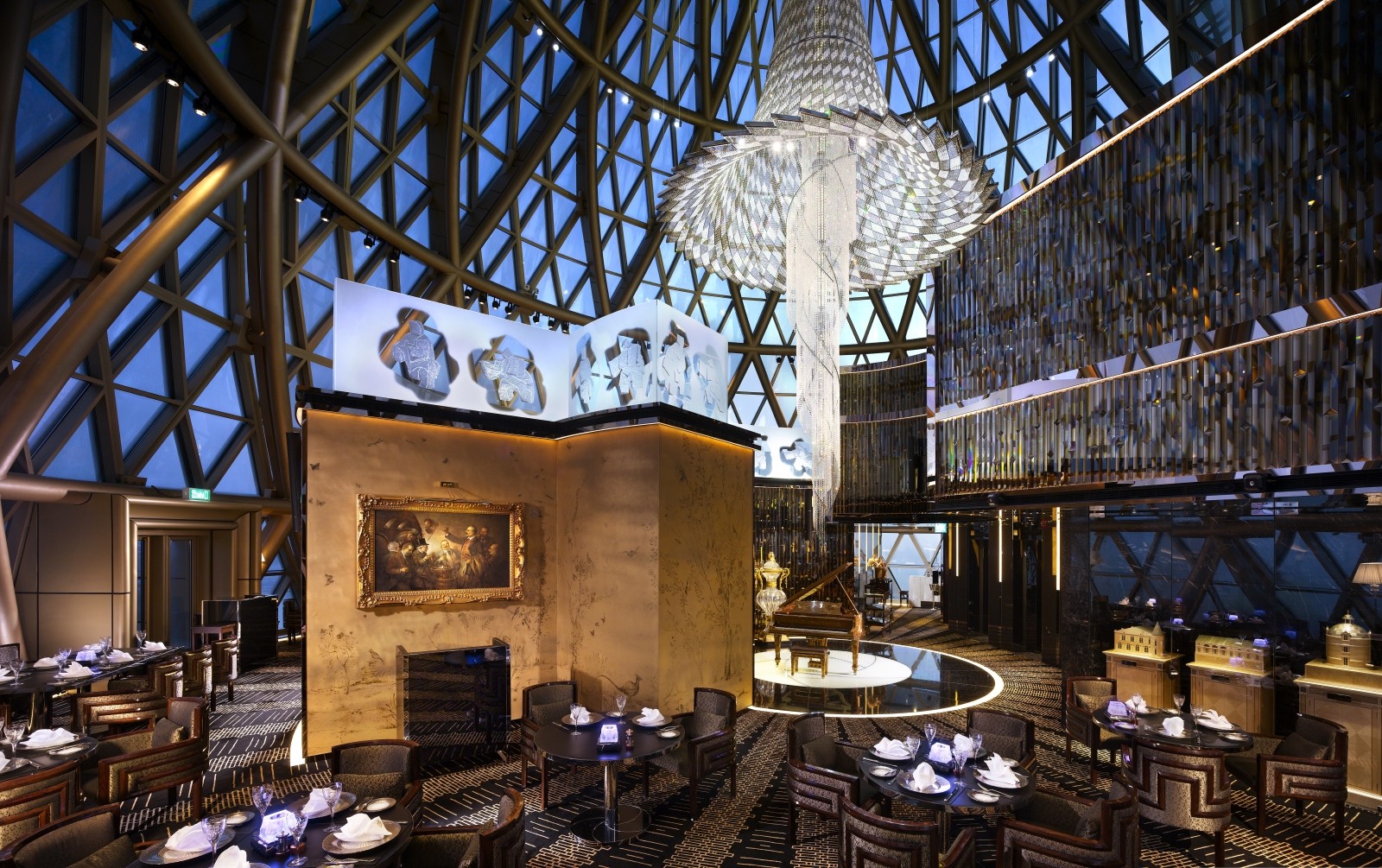 Robuchon au Dôme features a chandelier cascading from the central dome. Photos: handouts