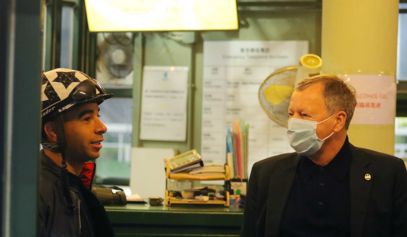 Jockey Club chief executive Winfried Engelbrecht-Bresges chats to jockey Joao Moreira at Sha Tin on Tuesday morning.