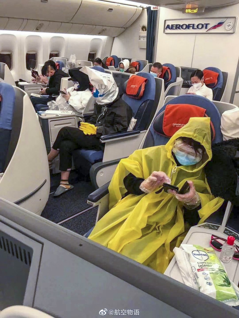 Passengers on a flight from London bound for Hong Kong via Moscow take no chances. Photo: Weibo