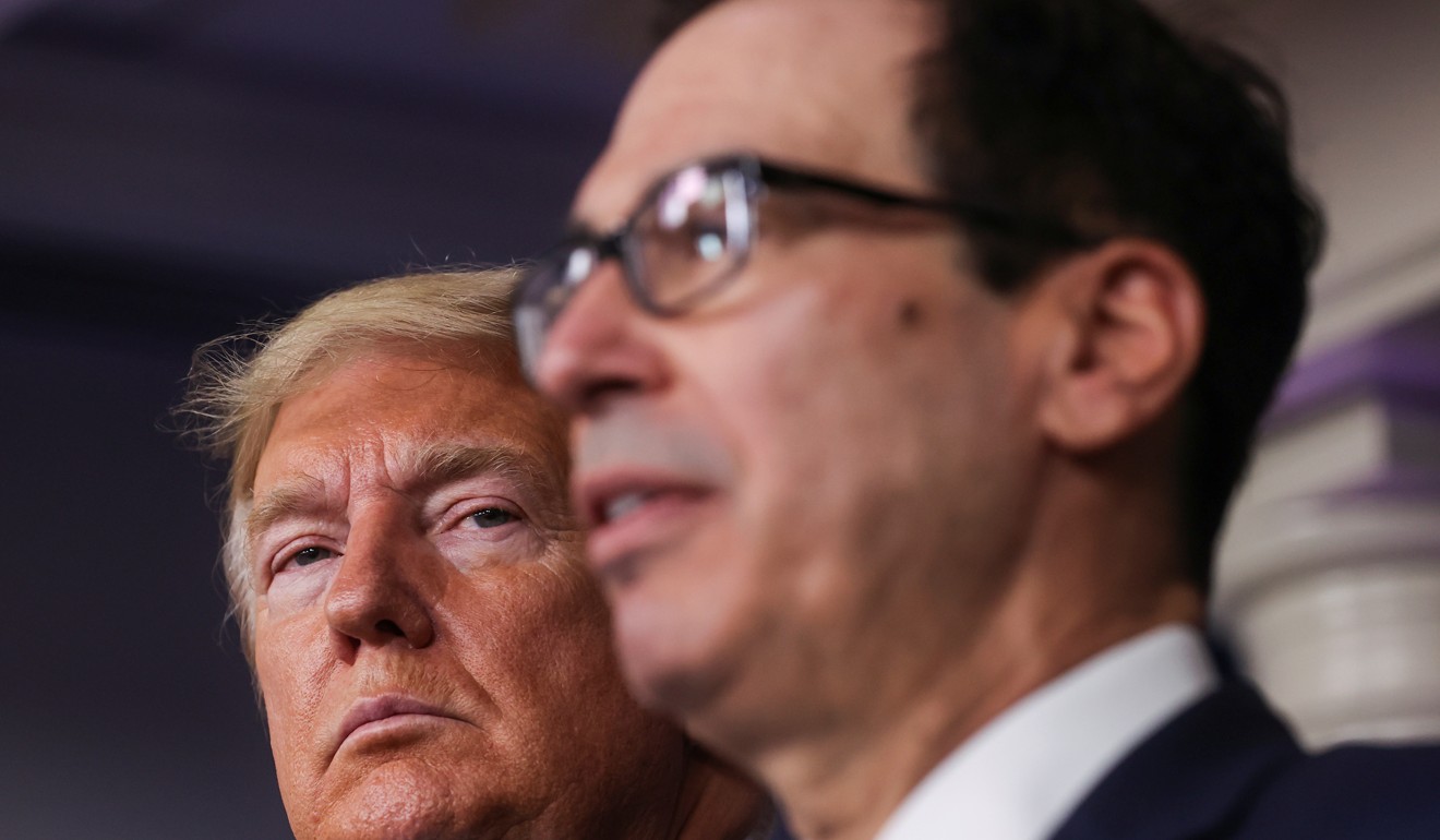 Trump and Mnuchin during the briefing Tuesday at the White House. Photo: Reuters