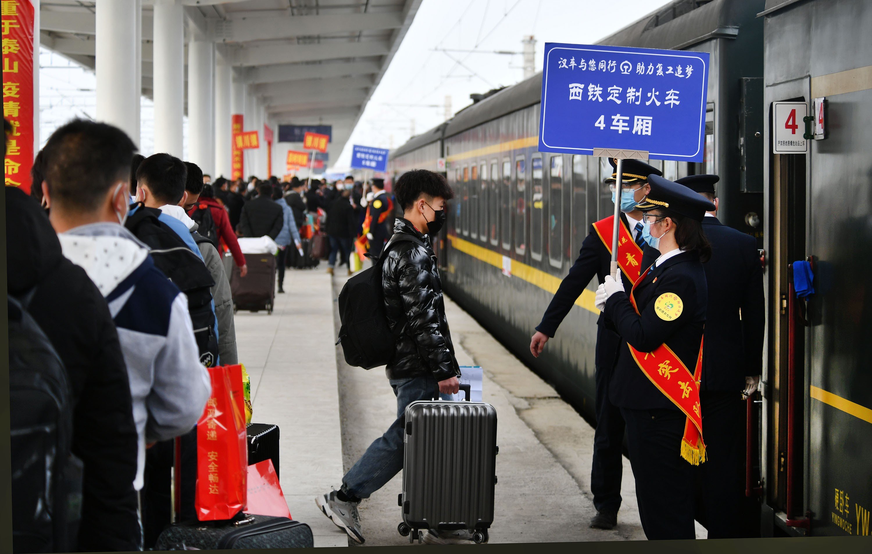Migrant workers board special trains to return to their jobs in the cities as China tries to get back to normality. Photo: Xinhua