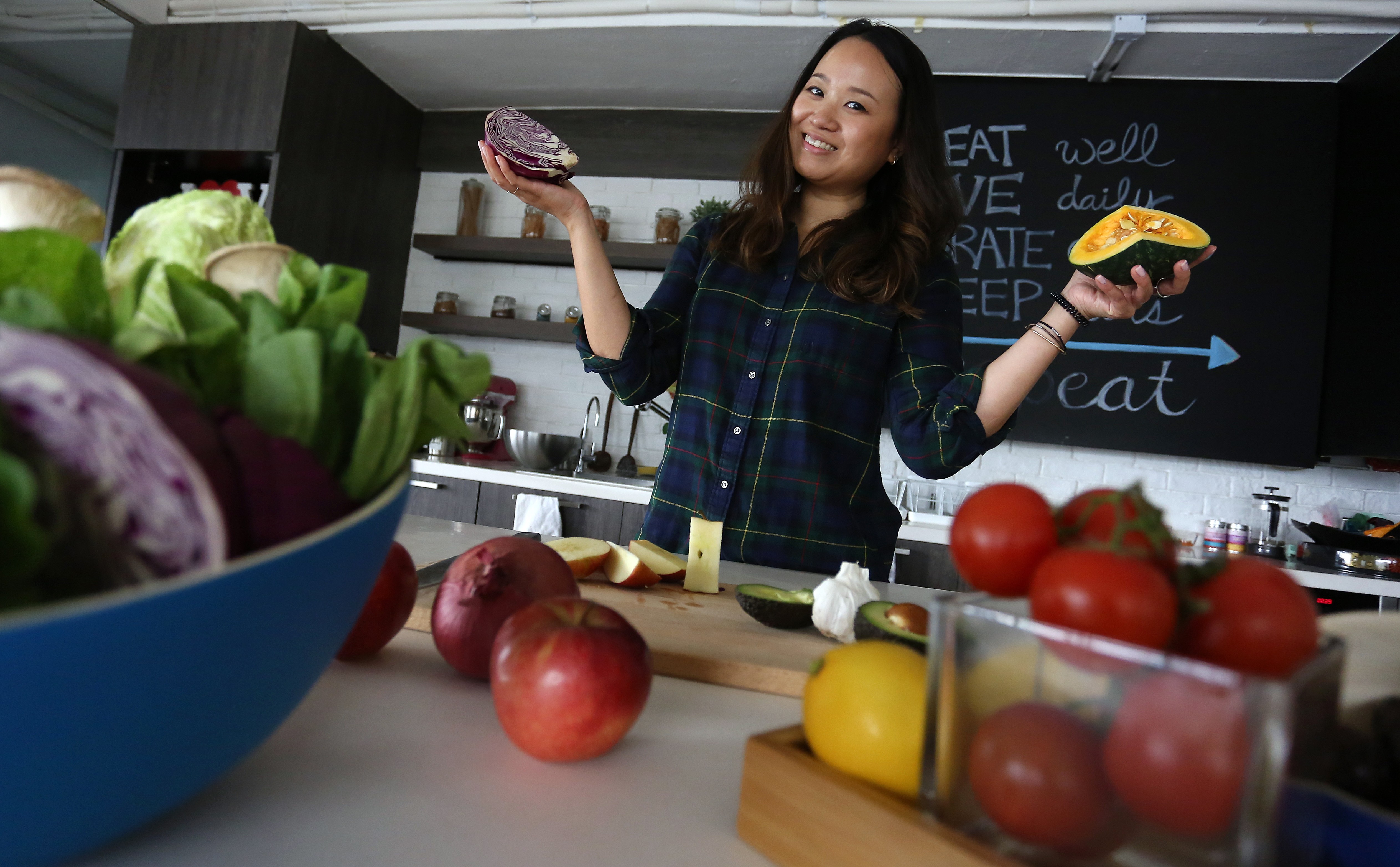 Cancer survivor and nutritionist Denise Tam at her family’s Food For Life organic health shop in Aberdeen, Hong Kong. Photo: Jonathan Wong