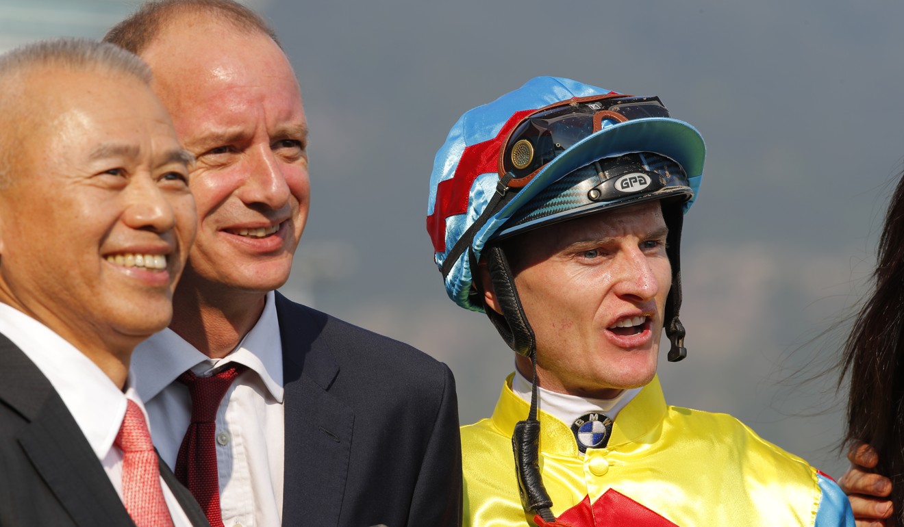 Trainer Richard Gibson with jockey Zac Purton and connections at Sha Tin on Sunday.