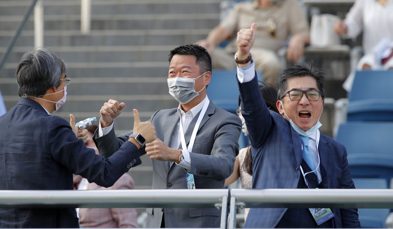 Golden Sixty’s owner Stanley Chan celebrates his gelding’s Hong Kong Derby win.