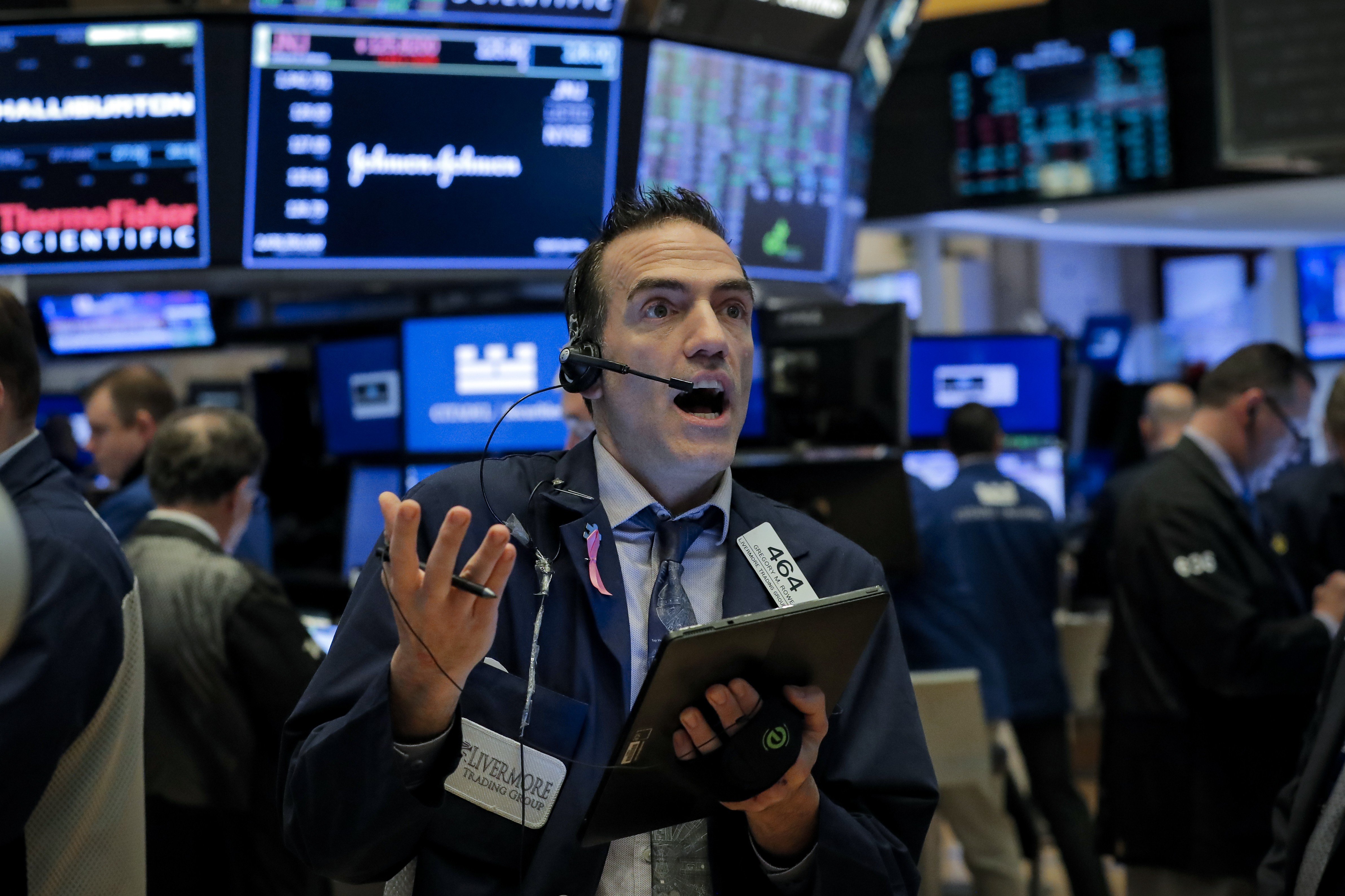 Traders work on the floor of the New York Stock Exchange. Photo: REUTERS