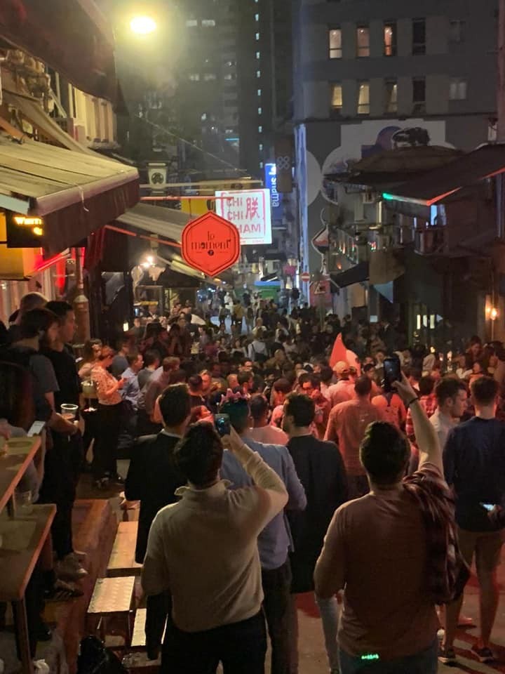 A crowd of drinkers on Peel Street, SoHo, last Friday night.