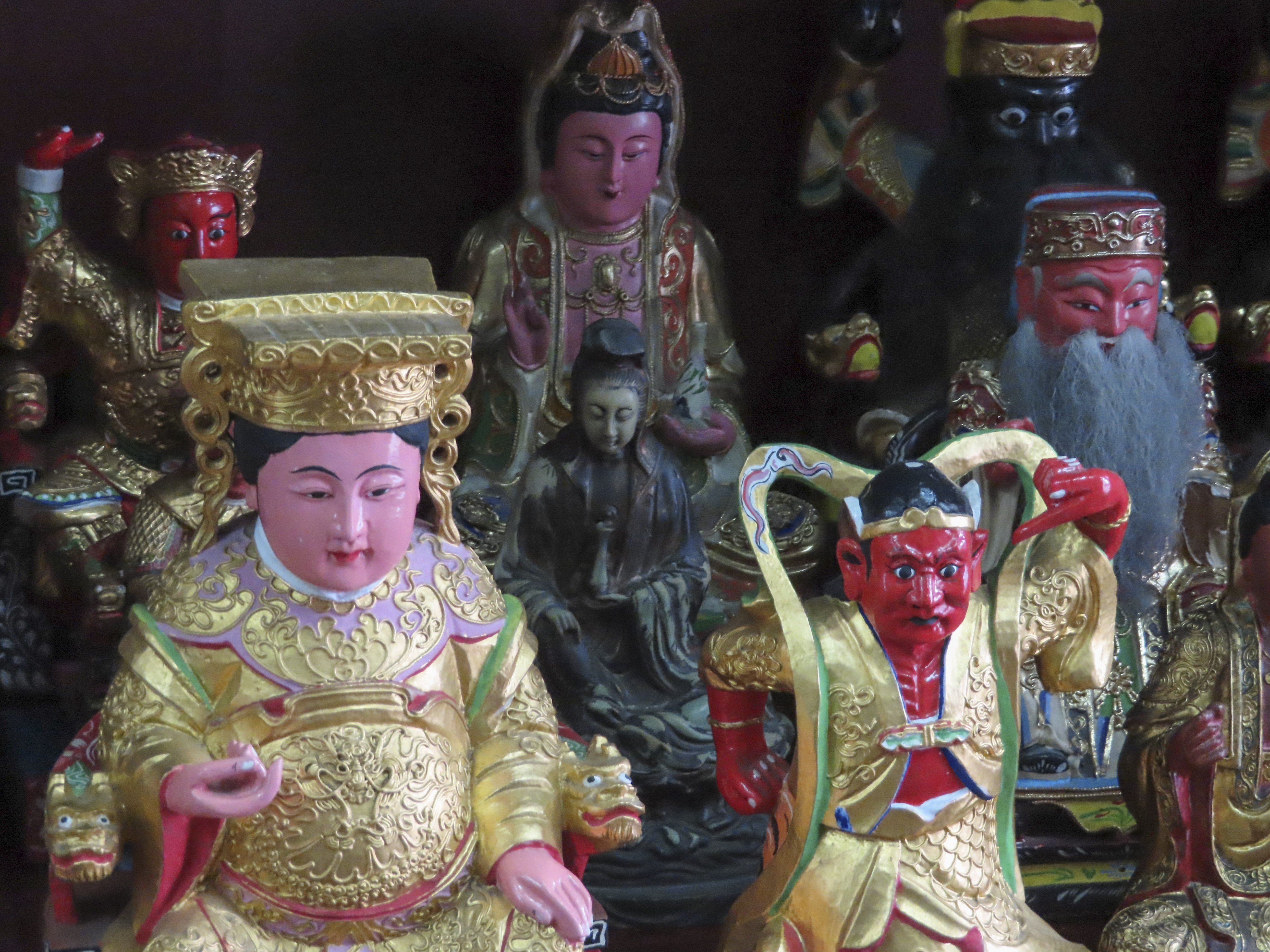 Statues of deities at Say Tian Hng, in Singapore. Photo: David Leffman