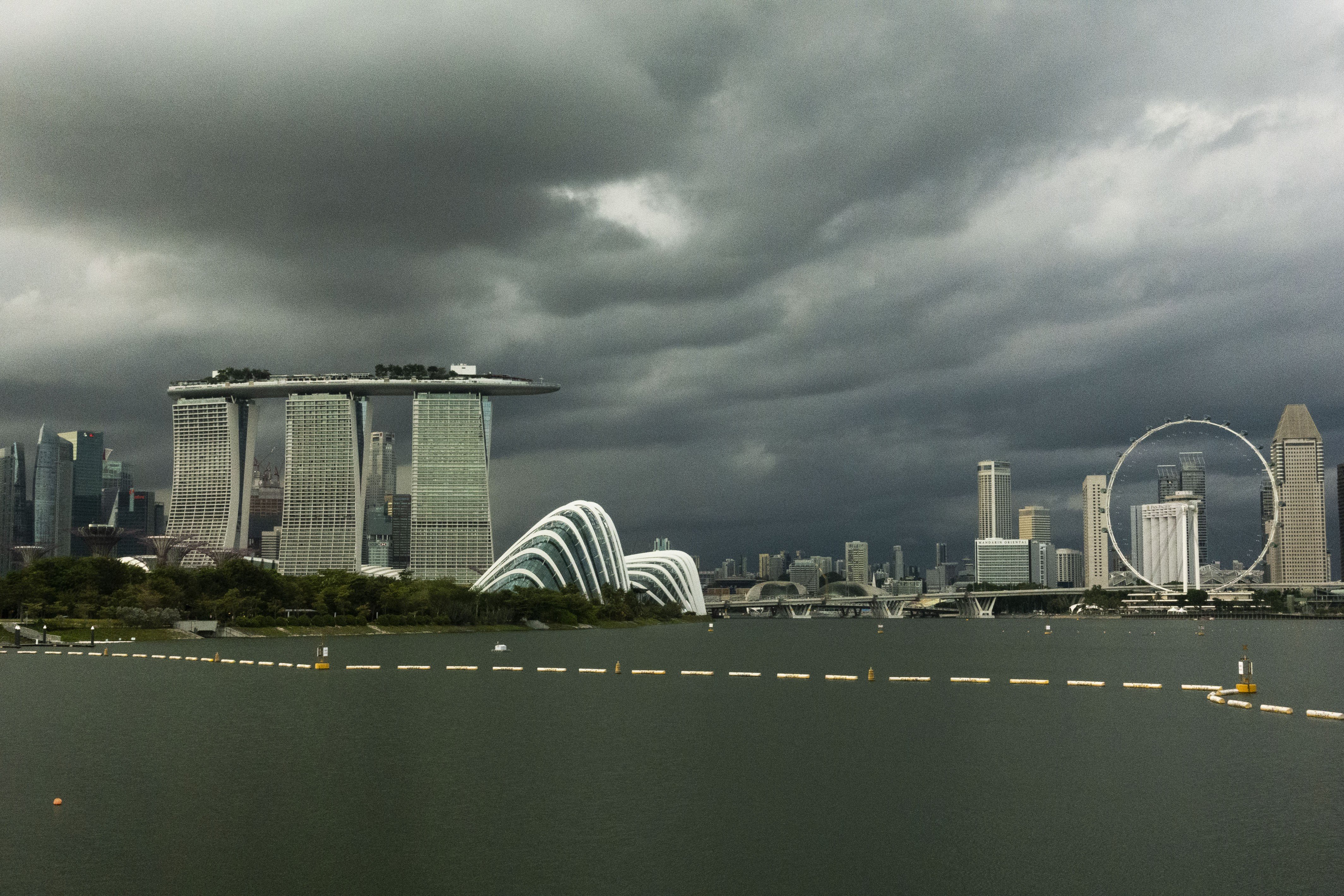 Dark clouds loom above the Singapore’s skyline on February 10. Photo: Xinhua