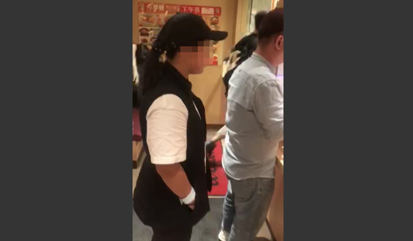 A girl wearing a wristband was caught dining at a Japanese restaurant on Monday. Photo: Facebook