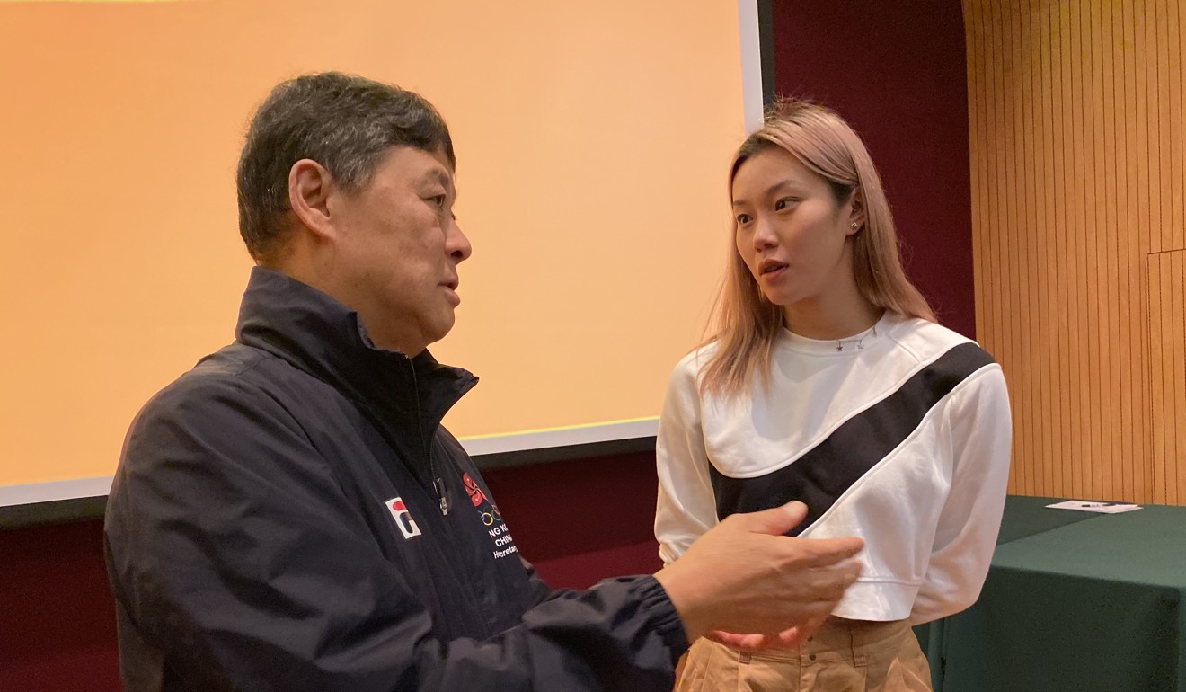 Ronnie Wong with Stephanie Au Hoi-shun when she is named 2019 Swimmer of the Year by the Hong Kong Swimming Coaches Association. Photo: Chan Kin-wa