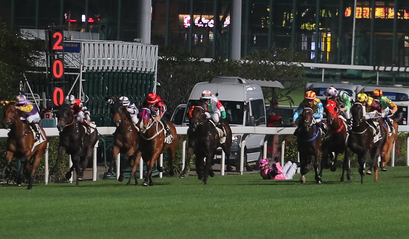 Jockey Vagner Borges falls during a race at Happy Valley on Wednesday night.