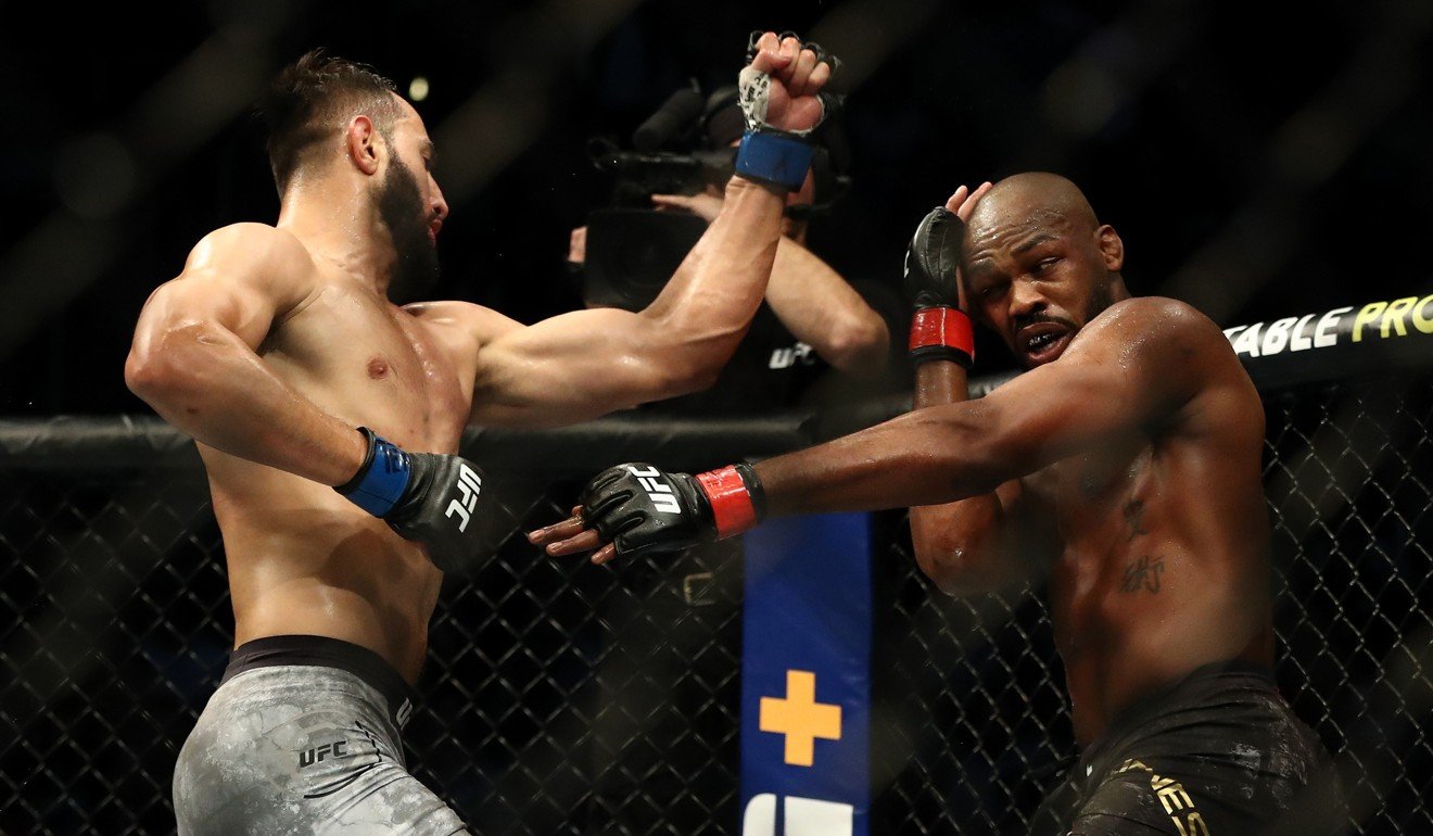 Jon Jones defends a punch from light heavyweight contender Dominick Reyes at UFC 247 in February. Photo: AFP