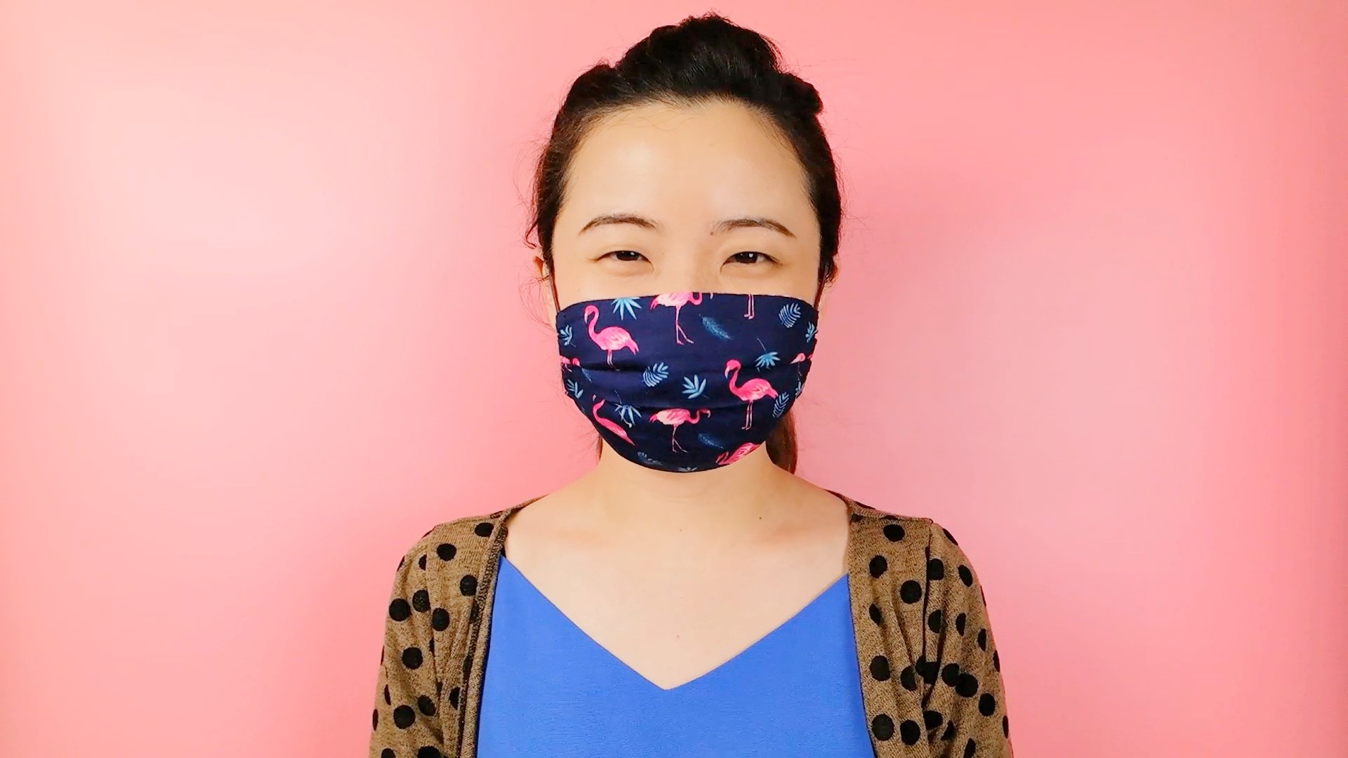 Ching Ng models her DIY face mask. Her online tutorial has clocked more than a million views.