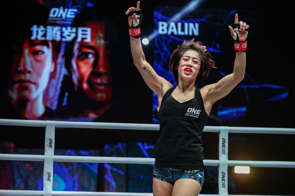 Meng Bo celebrates her victory against Laura Balin.
