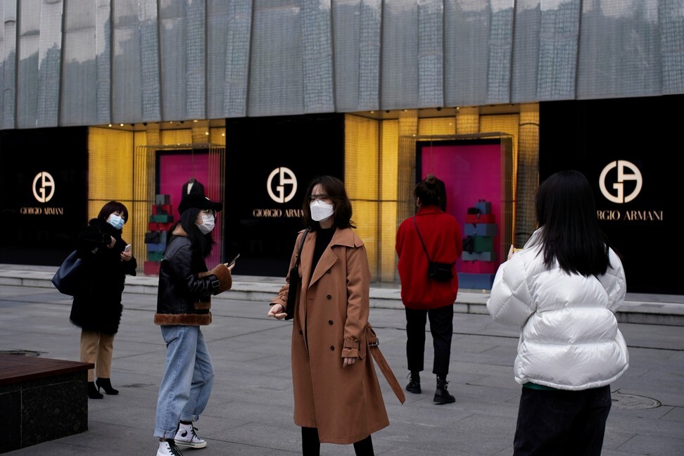 Shoppers are back on the streets in Wuhan. Photo: Reuters