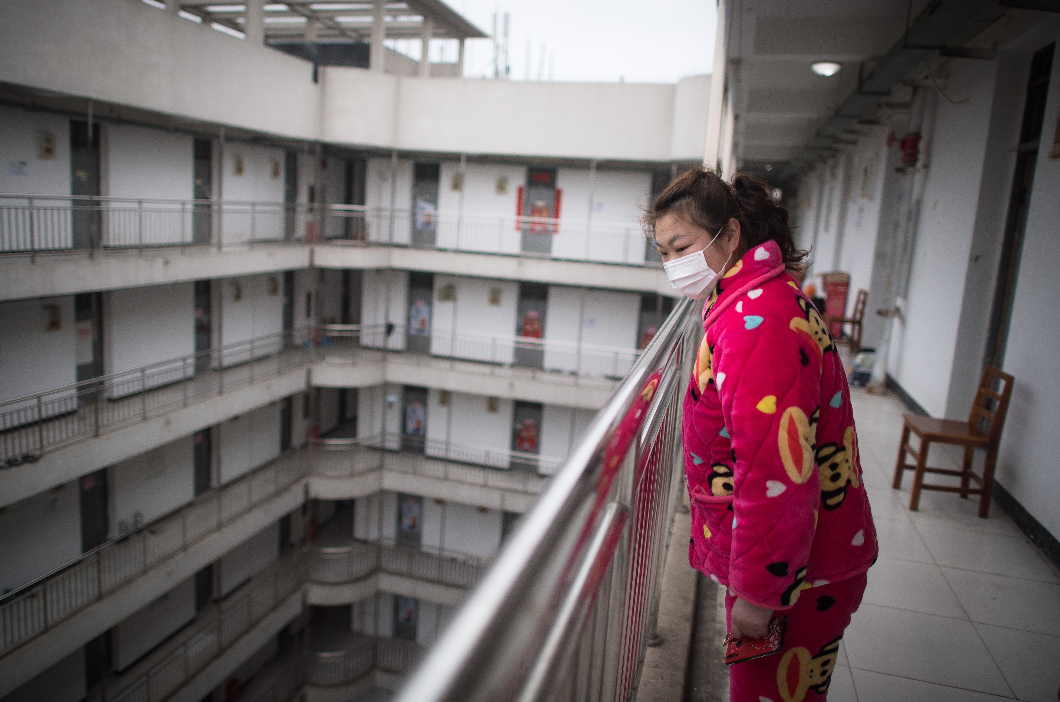 A recovered coronavirus patient waits to leave a rehabilitation centre in Wuhan, central China, after completing a 14-day quarantine under medical observation. Photo: Xinhua