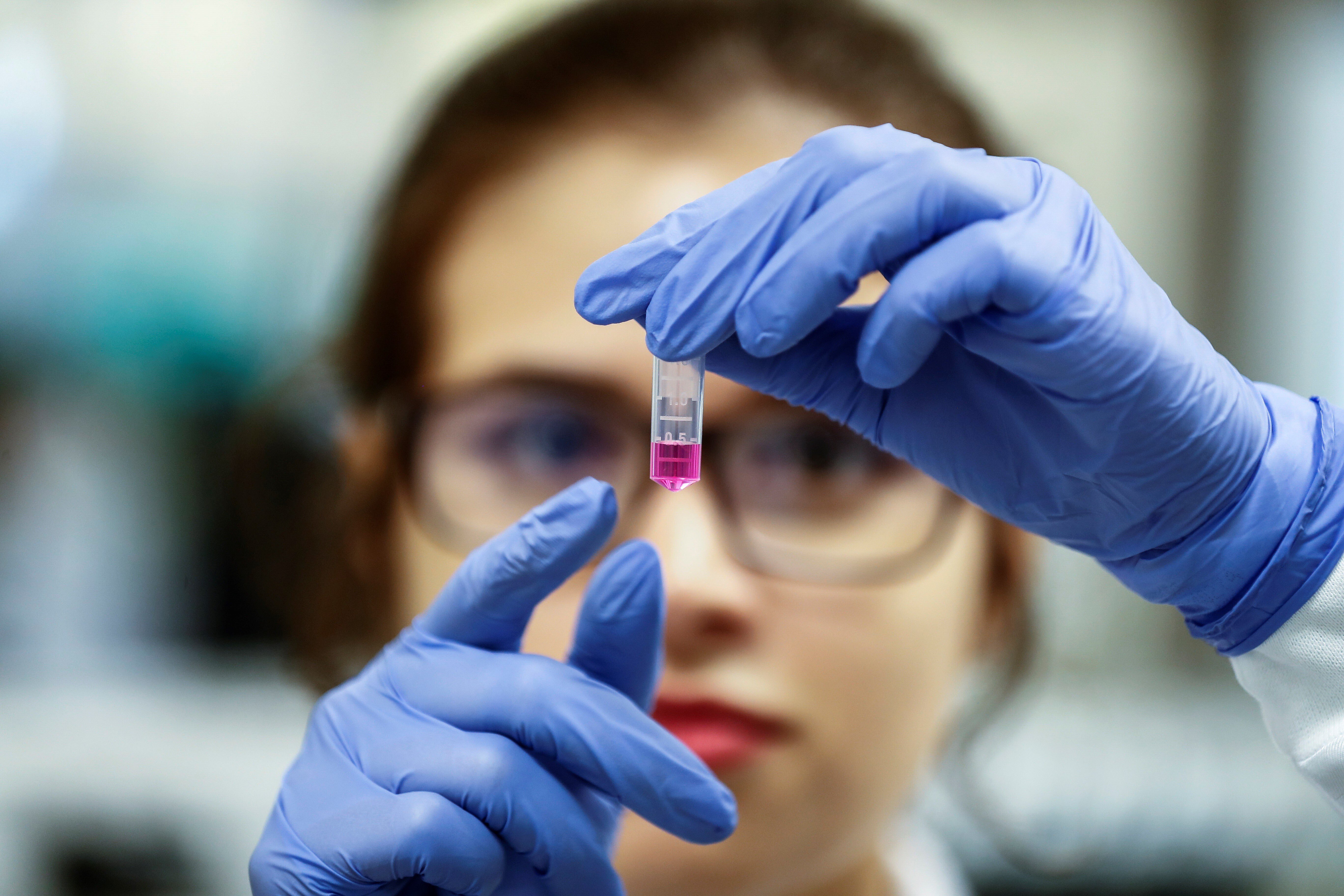 A scientist at a laboratory in Brazil works on a potential coronavirus vaccine, as researchers fast-track numerous possible treatments while the Covid-19 pandemic rapidly spreads. Photo: EPA-EFE