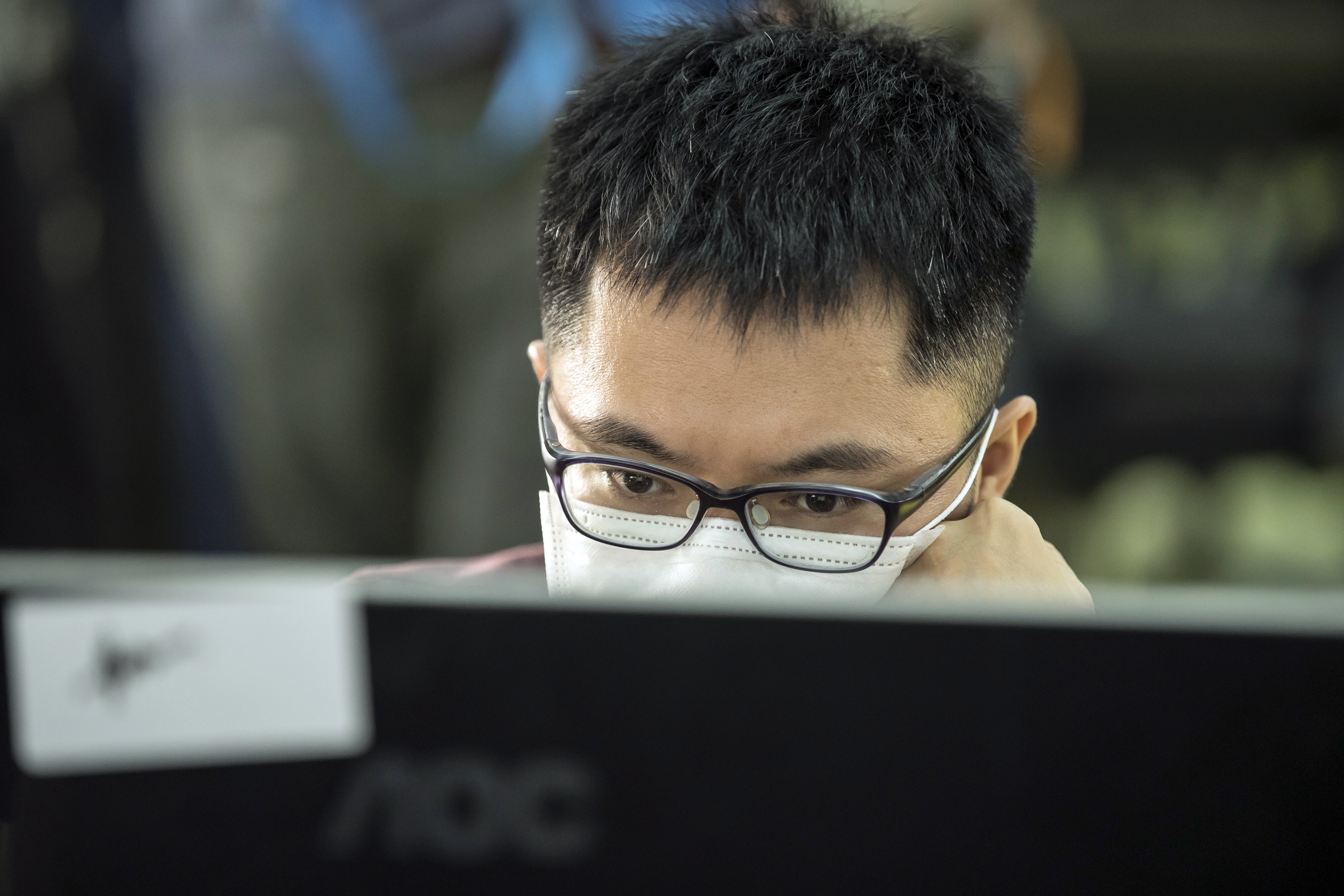 An employee at an animation studio in Shanghai at work on April 1. As of March 25, about 72 per cent of SMEs using cloud-based platforms had resumed production, according to the authorities. Photo: Bloomberg