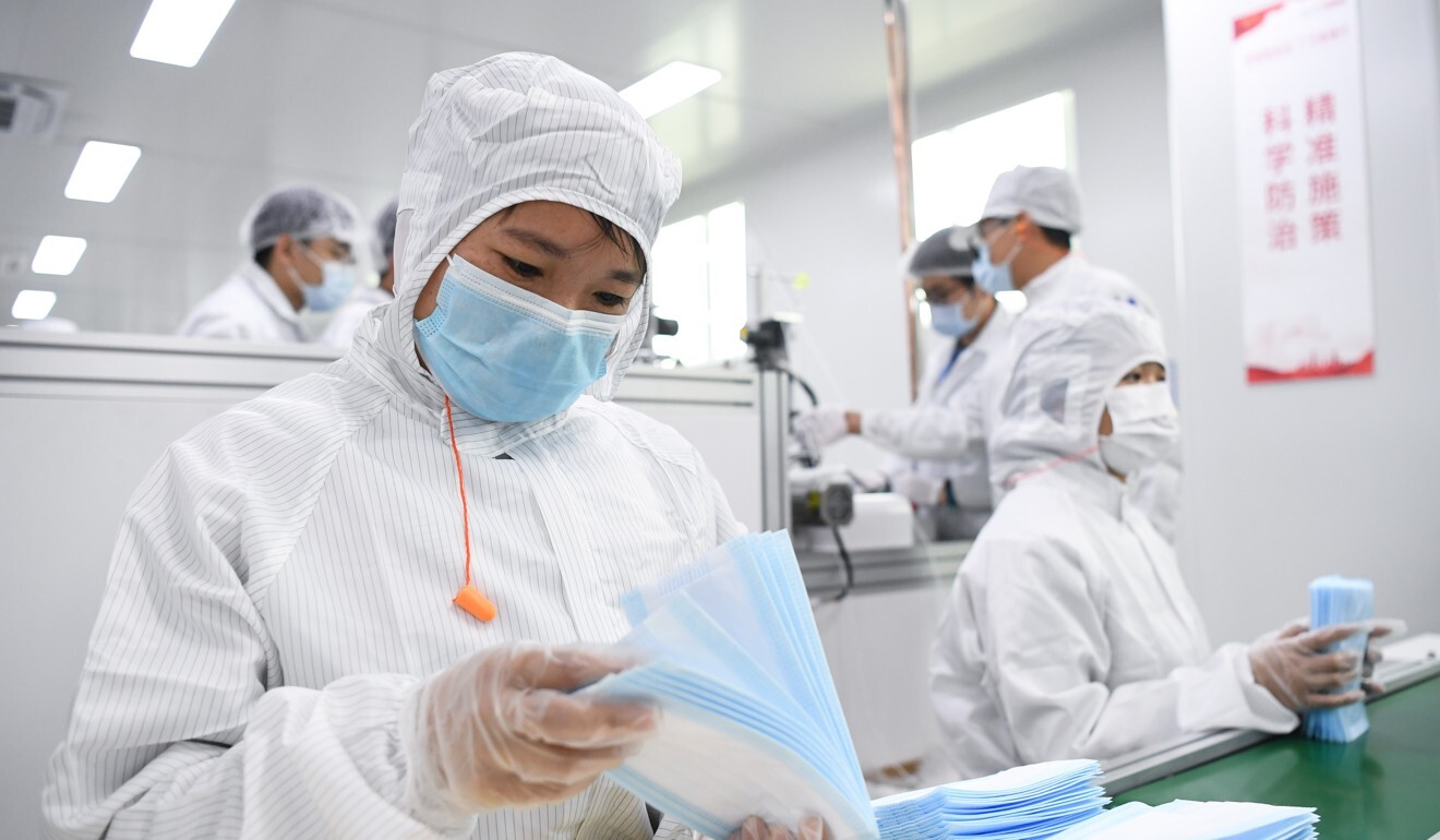 China is the world’s largest producer of face masks and protective gowns. Photo: Xinhua