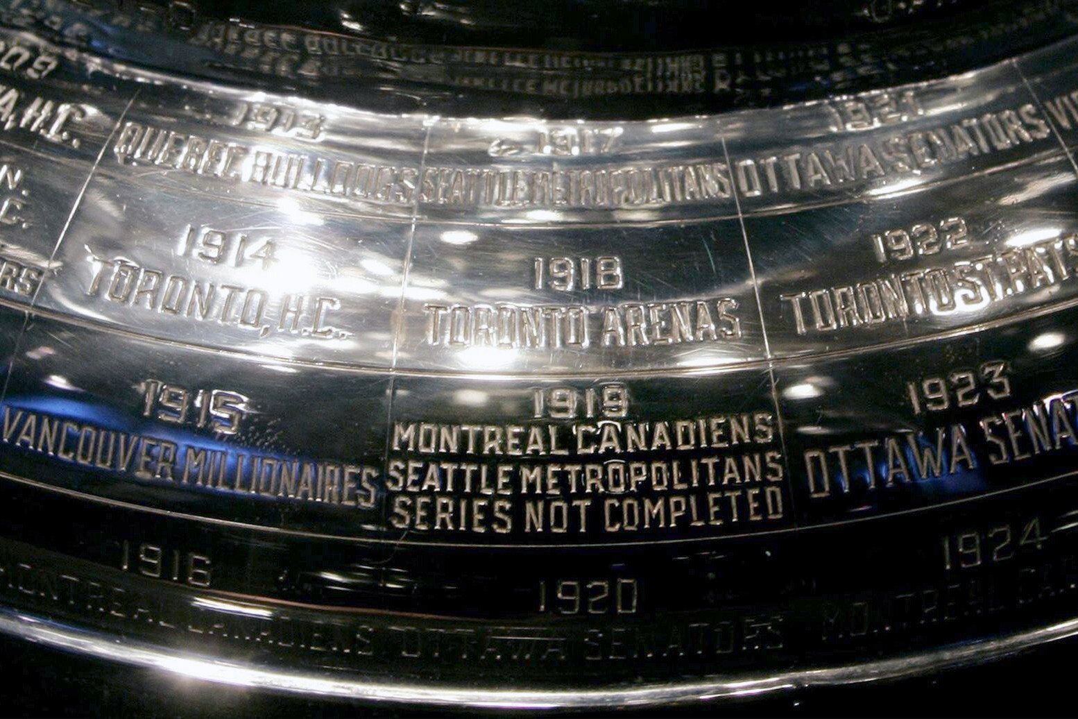 The inscription on the Stanley Cup showing the 1919 series not completed, displayed at the Hockey Hall of Fame in Toronto. Photo: AP