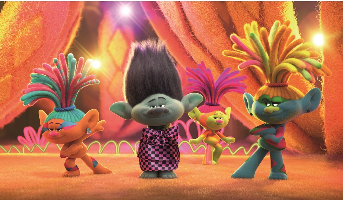 Branch (second from left, voiced by Justin Timberlake) in a still from Trolls World Tour.