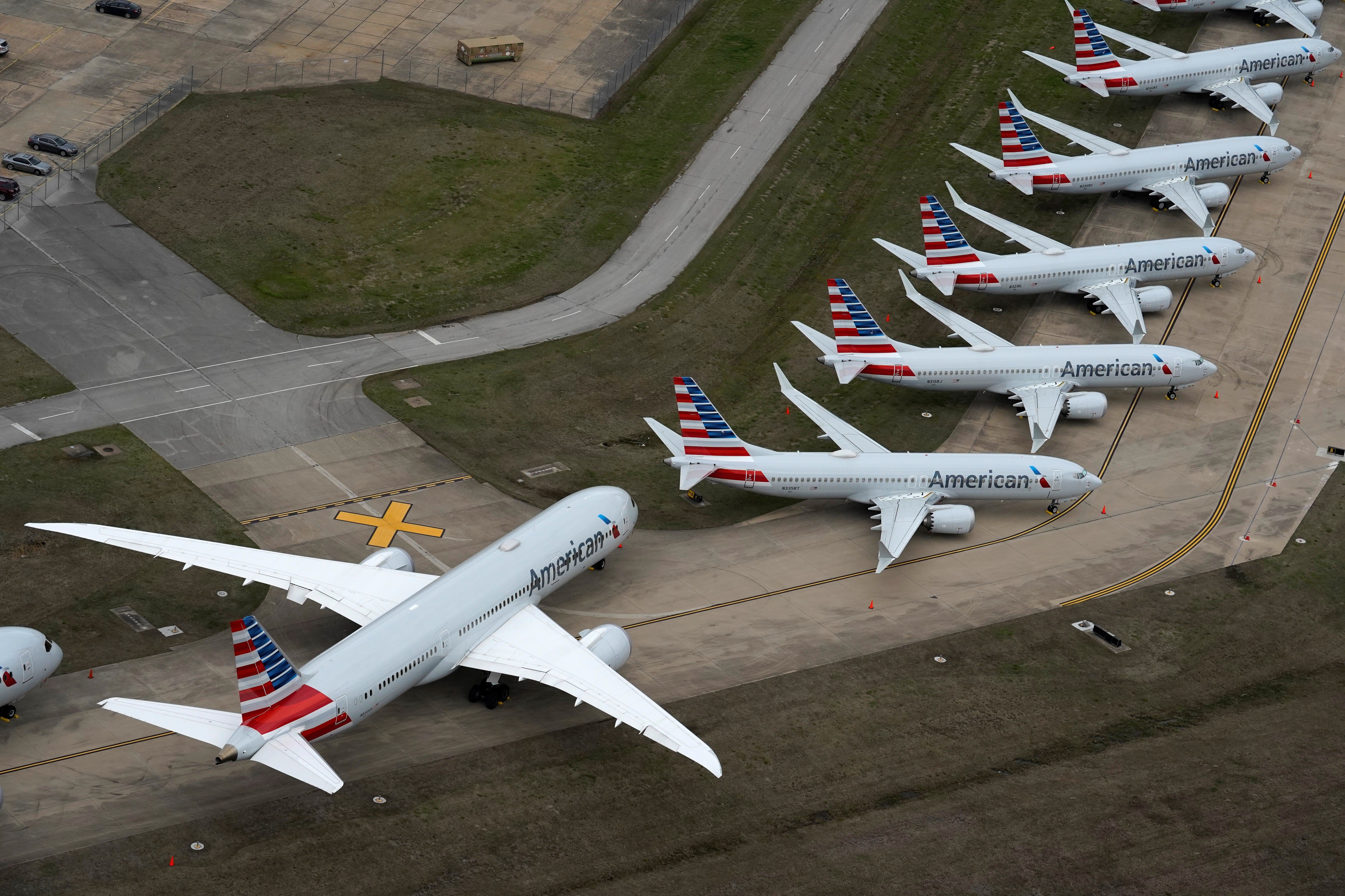 American Airlines planes crowd a runway at Tulsa airport where they have been parked due to the coronavirus pandemic. Photo: Reuters