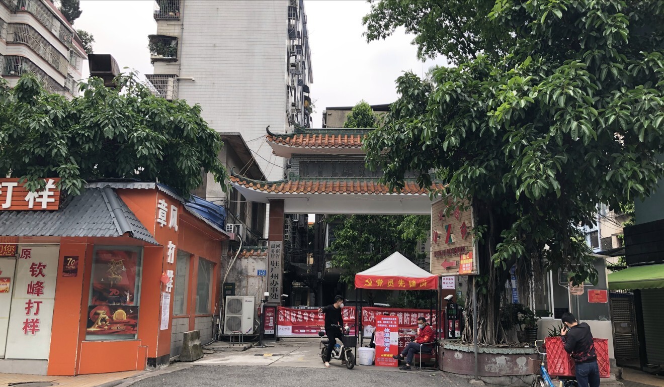 Entry to Kuangquan Street in Yuexiu district is being strictly controlled. Photo: Guo Rui