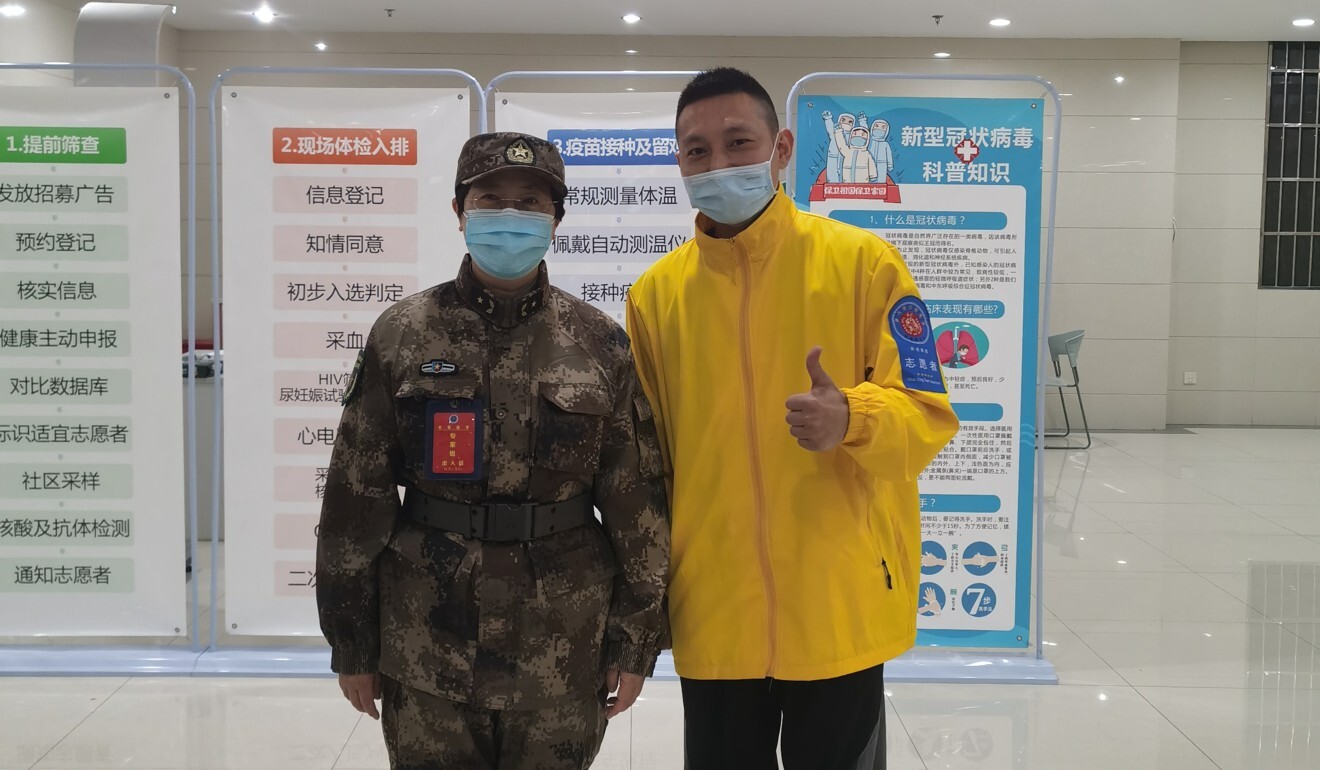 Xiang (right) said team leader Chen Wei (left) told him about the development of the vaccine and assured him he would come to no harm. Photo: Handout