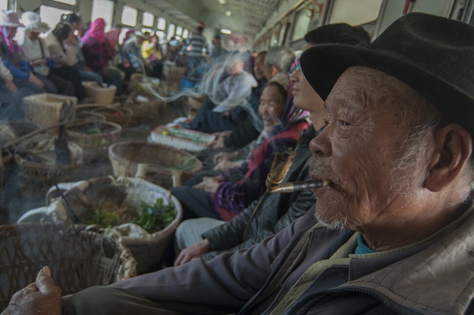Train No 6061 from Liupanshui, in Guizhou, to Kunming, in Yunnan, in February 2014. The conventional seating plan has been changed to facilitate the transport of vegetables. Photo: Qian Haifeng