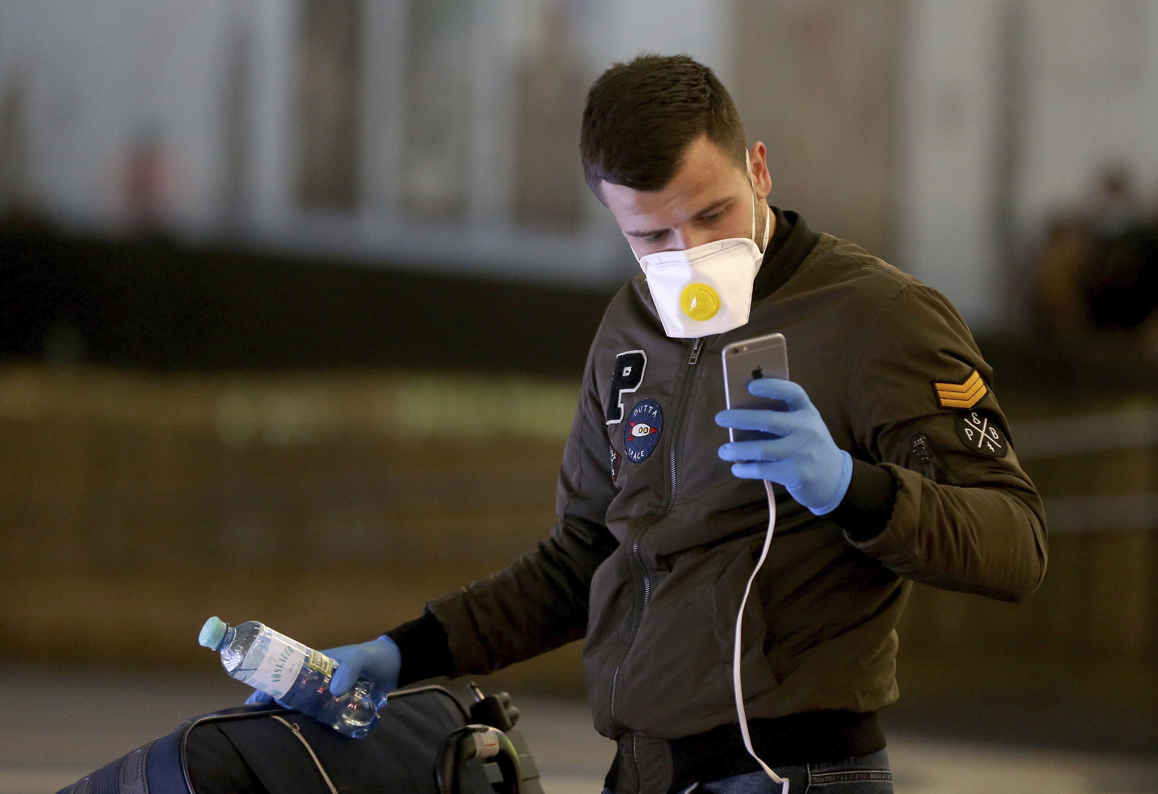 A man wears a face mask at Vienna's Schwechat airport. Photo: AP
