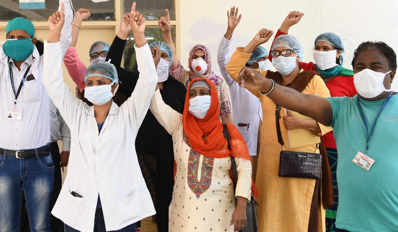 Medical staff in Amritsar, Punjab state, shout slogans at a protest last week as they demand more personal protective equipment and coronavirus testing kits. Photo: AFP