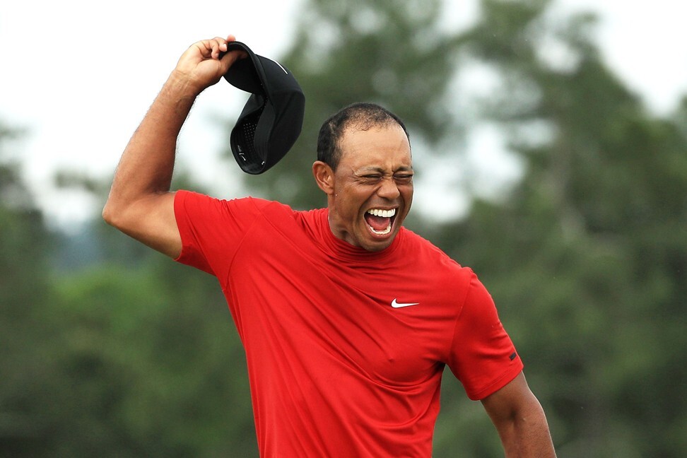 Tiger Woods celebrates after sinking his putt on the 18th green to win the final round of the 2019 Masters. His participation at the Tokyo Olympics may now be in doubt. Photo: AFP