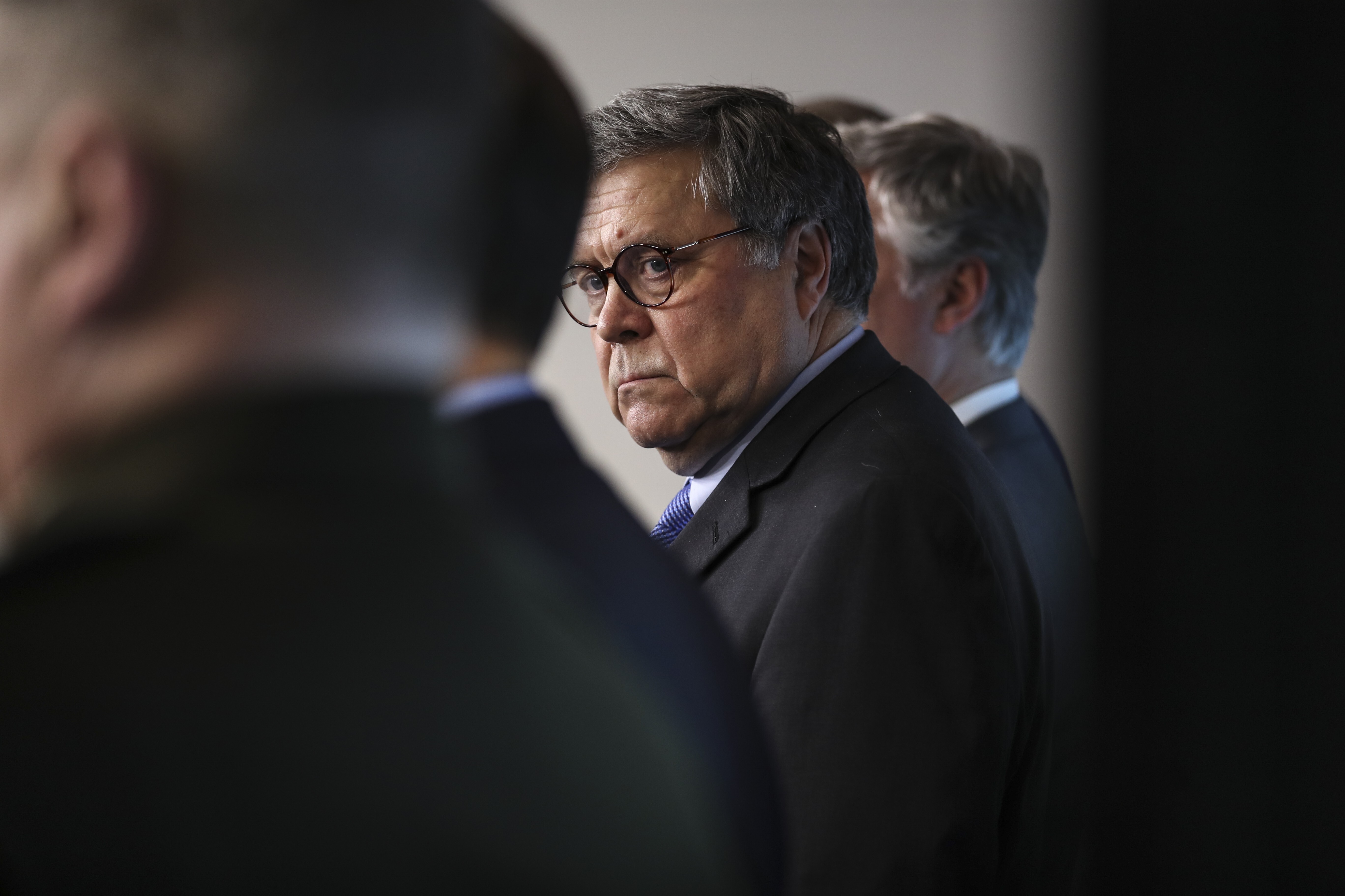 Attorney General William Barr listens during a coronavirus task force press briefing at the White House. Photo: Bloomberg