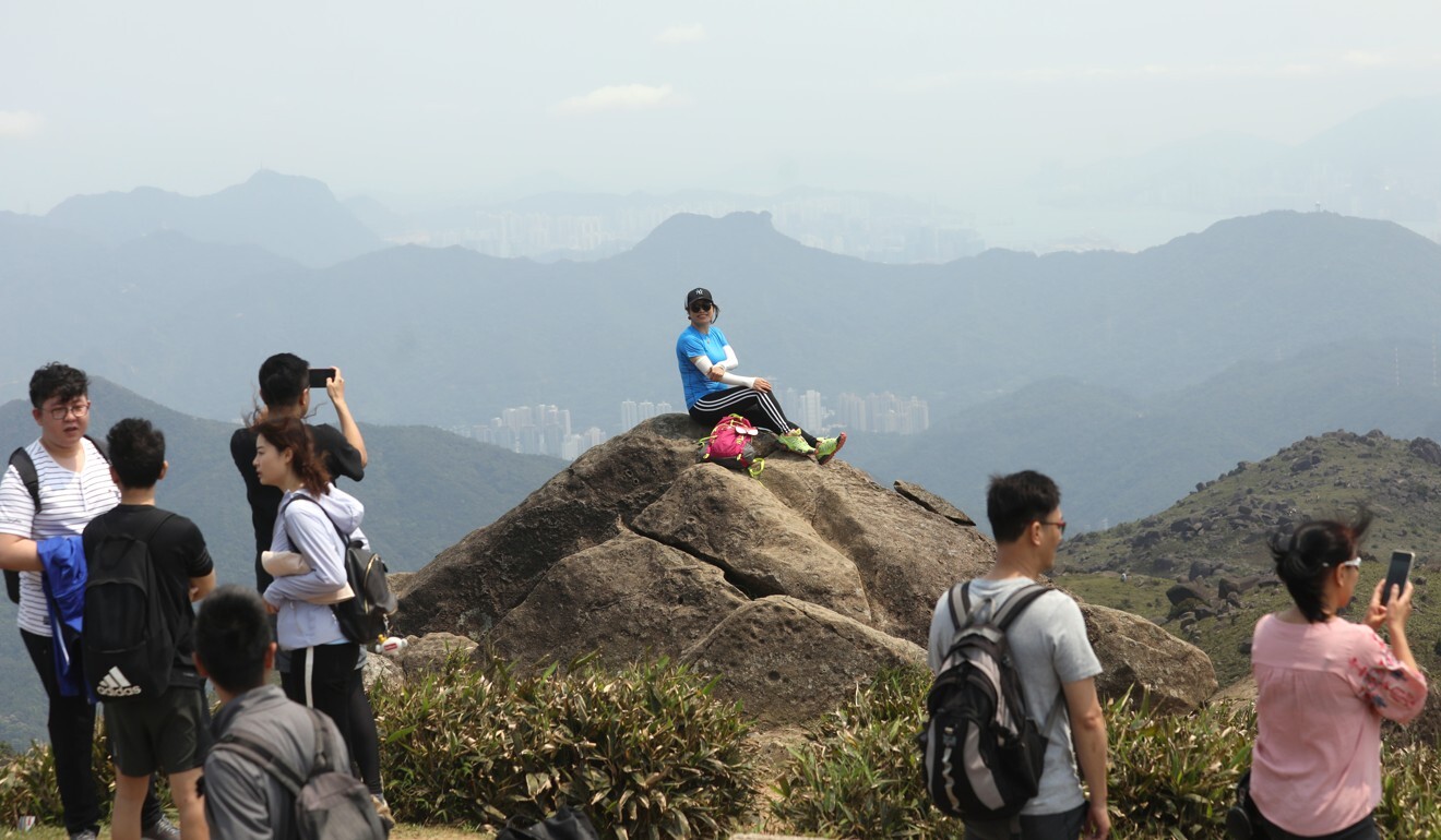 Hikers without masks at Tai Mo Shan on Friday. Photo: Dickson Lee