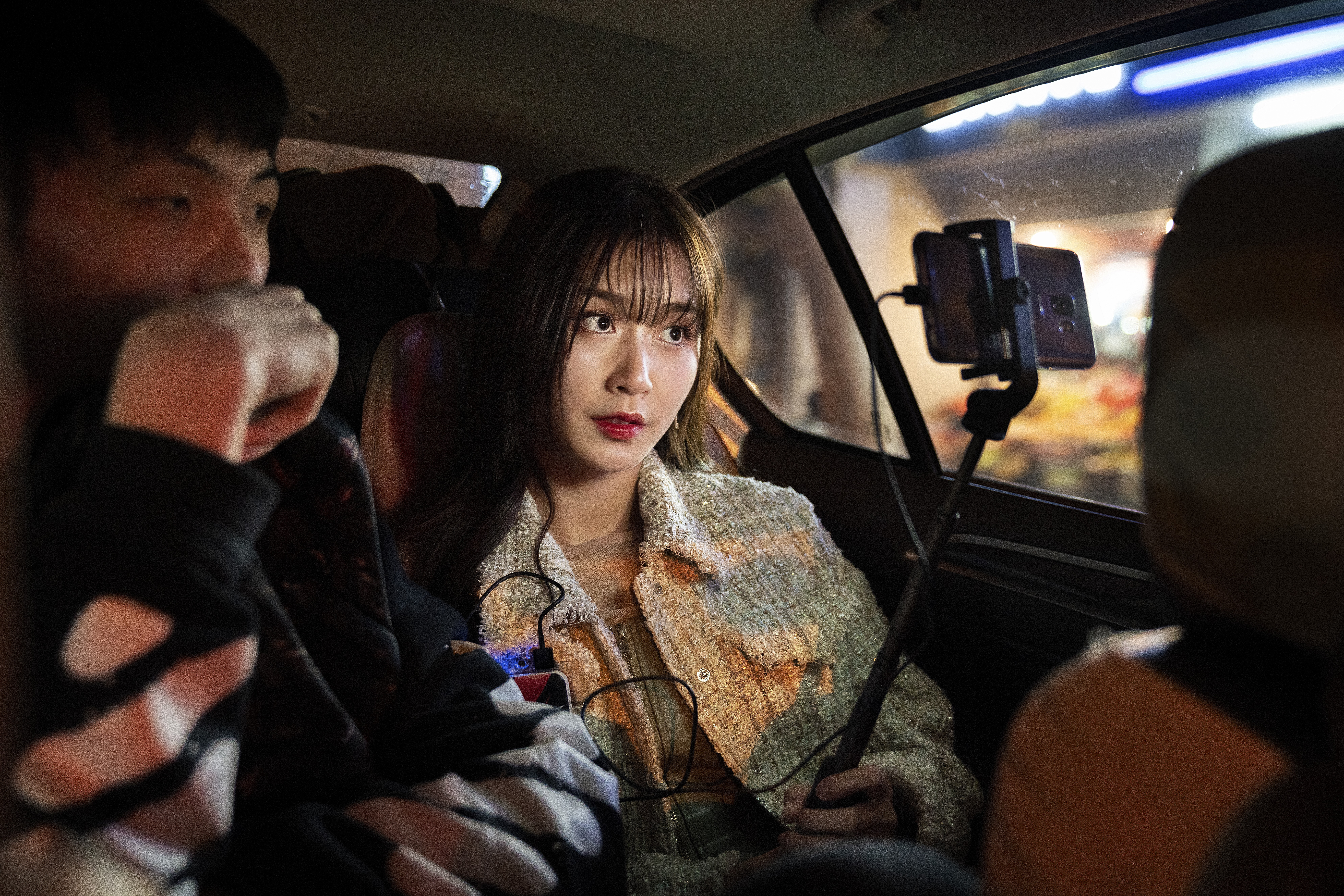 Nai Nai live-streams while sitting in a taxi with a fan after her birthday party in Shanghai, China, last March. Photo: Justin Jin