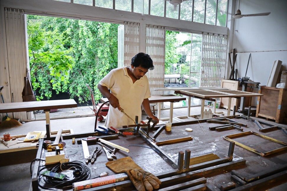 A craftsman working on furniture at P. Tendercool. Photo: P. Tendercool