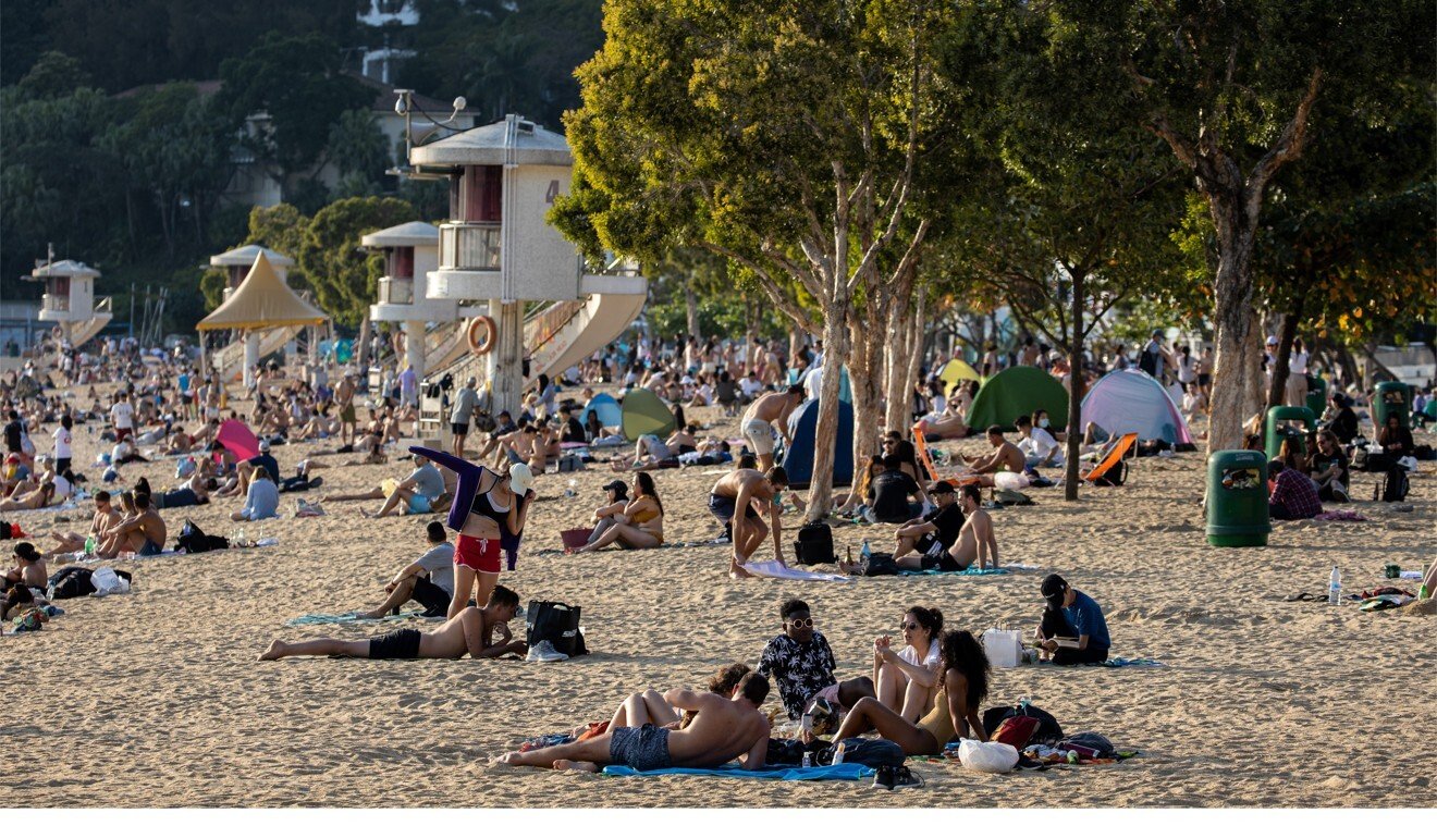 Beach goers crowd Repulse Bay beach in Hong Kong over the Easter weekend. Photo: EPA-EFE