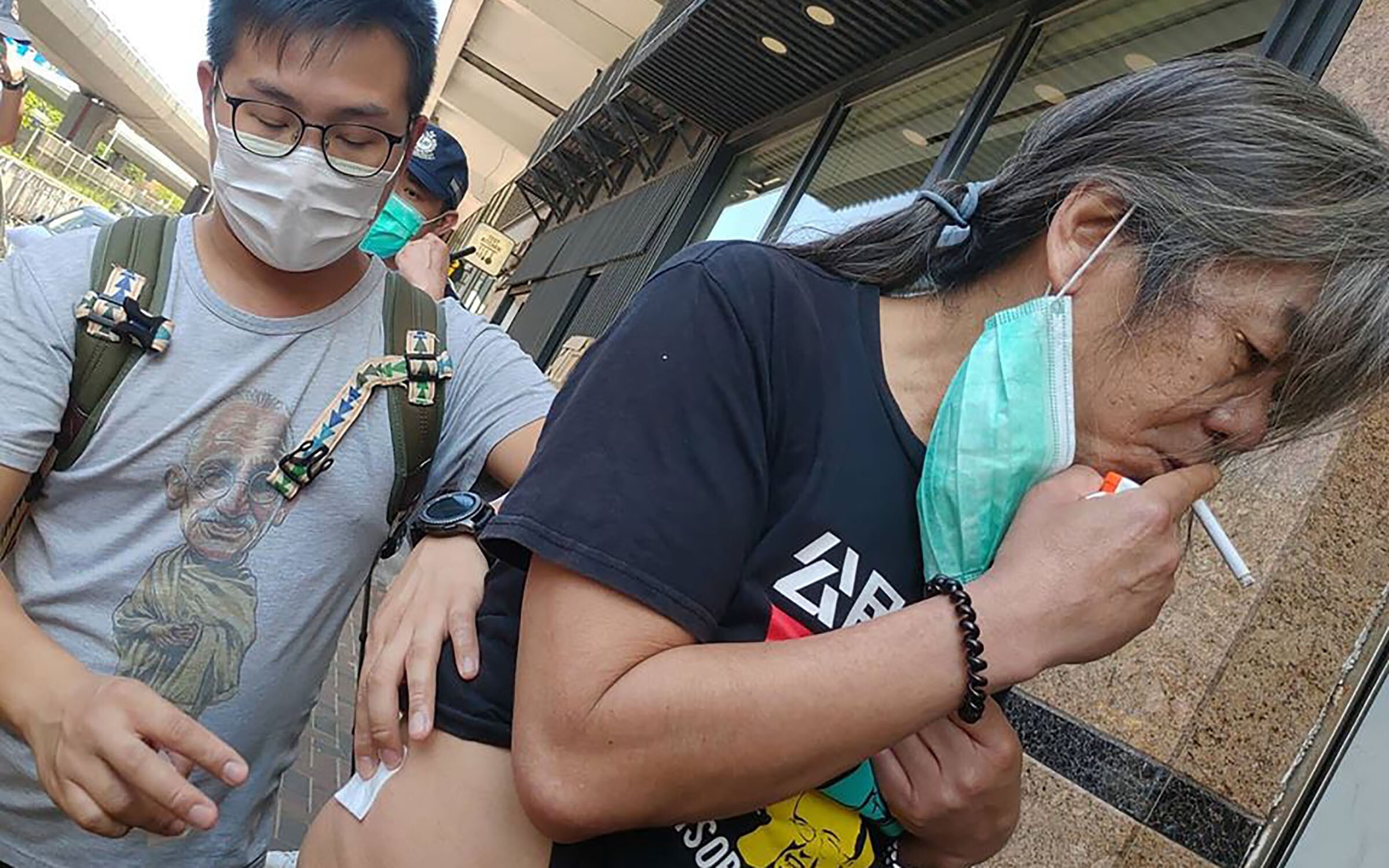 Activist and disqualified lawmaker ‘Long Hair’ Leung Kwok-hung was stabbed while protesting outside the central government’s liaison office in Hong Kong on Thursday but received only minor injuries. Photo: SCMP